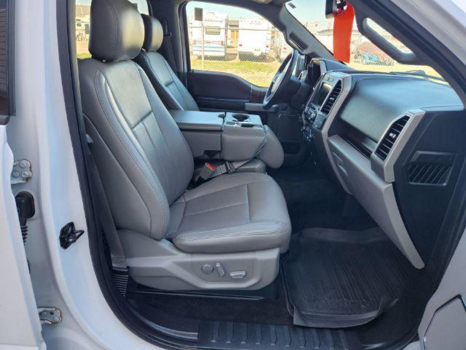 2018 White Platinum Metallic Tri-Coat /Medium Earth Gray, leather Ford F-150 Lariat SuperCrew 6.5-ft. Bed 4WD (1FTEW1EG1JK) with an 3.5L V6 TURBO engine, Automatic transmission, located at 1235 N Woodruff Ave., Idaho Falls, 83401, (208) 523-1053, 43.507172, -112.000488 - The 3.5L EcoBoost is an absolute powerhouse with 375 Horsepower, 470 torque, and a max towing capacity of 14,000lbs! This truck and all its power can still achieve up to 17 MPG in town and up to 23 MPG out on the highway! Not only is it strong and efficient, but it also very comfortable with its 6 l - Photo #21