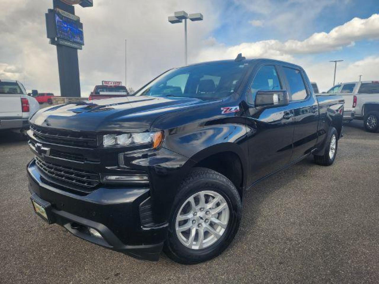 2020 Black /Jet Black, leather Chevrolet Silverado 1500 RST Crew Cab Long Box 4WD (1GCUYEEL3LZ) with an 6.2L V8 OHV 16V engine, Automatic transmission, located at 1235 N Woodruff Ave., Idaho Falls, 83401, (208) 523-1053, 43.507172, -112.000488 - These 6.2L V8 Chevy half tons with the crew cab and the 6.5ft bed are almost impossible to find! This truck is in amazing condition inside and out! It is completely stock with zero modifications. With such low miles this vehicle should last you a very long time! The black exterior is complimented by - Photo #1