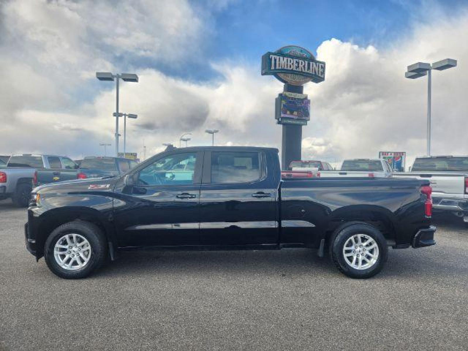 2020 Black /Jet Black, leather Chevrolet Silverado 1500 RST Crew Cab Long Box 4WD (1GCUYEEL3LZ) with an 6.2L V8 OHV 16V engine, Automatic transmission, located at 1235 N Woodruff Ave., Idaho Falls, 83401, (208) 523-1053, 43.507172, -112.000488 - These 6.2L V8 Chevy half tons with the crew cab and the 6.5ft bed are almost impossible to find! This truck is in amazing condition inside and out! It is completely stock with zero modifications. With such low miles this vehicle should last you a very long time! The black exterior is complimented by - Photo #2