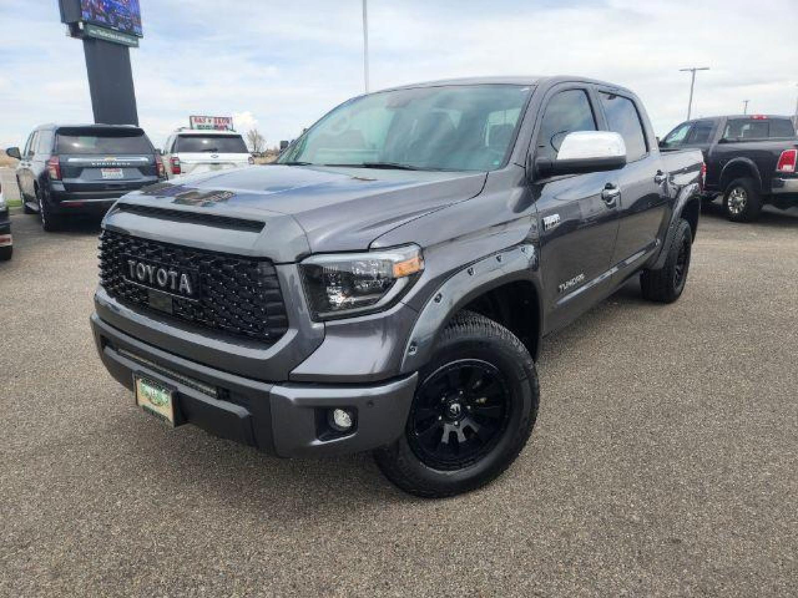 2021 Magnetic Gray Metallic /Black, leather Toyota Tundra Limited 5.7L CrewMax 4WD (5TFHY5F18MX) with an 5.7L V8 DOHC 32V engine, Automatic transmission, located at 1235 N Woodruff Ave., Idaho Falls, 83401, (208) 523-1053, 43.507172, -112.000488 - This is one loaded up 2021 Toyota Tundra!! The LIMITED package offers JBL premium sound, remote start, heated seats, blind spot monitors, lane assist, front collision avoidance, power running boards, and so much more! The Tundra CrewMax has massive amounts of leg room and storage room. Your new pre- - Photo #1