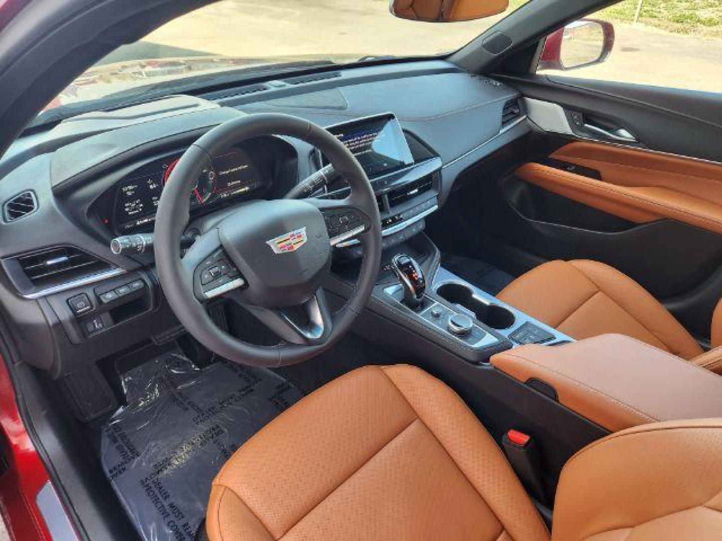 2022 Infrared Tintcoat /Cinnamon w/Jet Black Accents Cadillac CT4 Premium Luxury (1G6DF5RL7N0) with an 2.7L L4 DOHC 16V TURBO engine, 8-Speed Automatic transmission, located at 1235 N Woodruff Ave., Idaho Falls, 83401, (208) 523-1053, 43.507172, -112.000488 - Wow, just wow!! This is one really nice car! It will check all the boxes- fuel efficient, powerful, AWD, comfortable, luxurious, great looking, roomy, fun to drive, the list goes on and on! It has all the driver safety options, heads up display, adjustable driving specs, navigation, Apple car play, - Photo#13