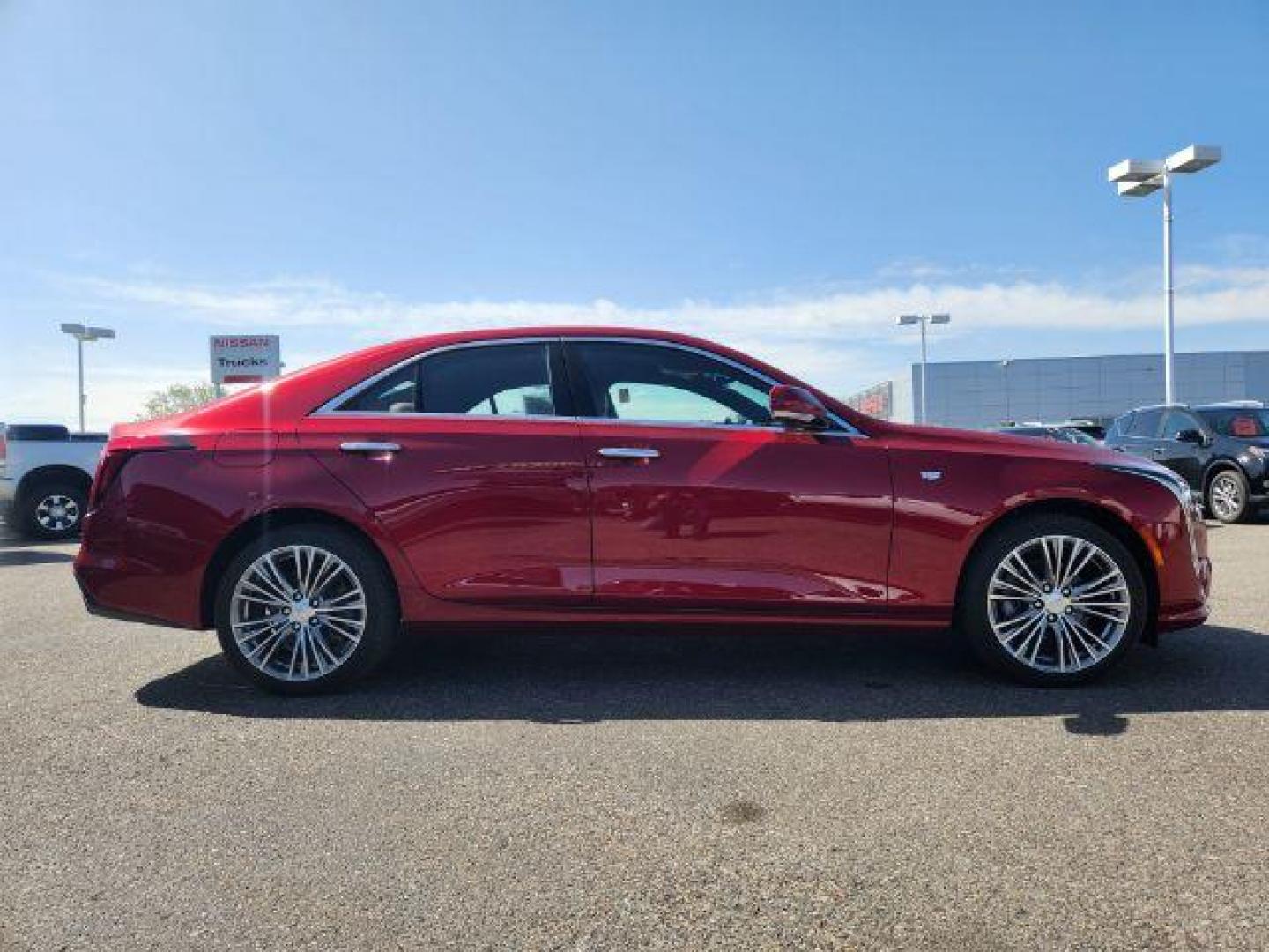 2022 Infrared Tintcoat /Cinnamon w/Jet Black Accents Cadillac CT4 Premium Luxury (1G6DF5RL7N0) with an 2.7L L4 DOHC 16V TURBO engine, 8-Speed Automatic transmission, located at 1235 N Woodruff Ave., Idaho Falls, 83401, (208) 523-1053, 43.507172, -112.000488 - Wow, just wow!! This is one really nice car! It will check all the boxes- fuel efficient, powerful, AWD, comfortable, luxurious, great looking, roomy, fun to drive, the list goes on and on! It has all the driver safety options, heads up display, adjustable driving specs, navigation, Apple car play, - Photo#6