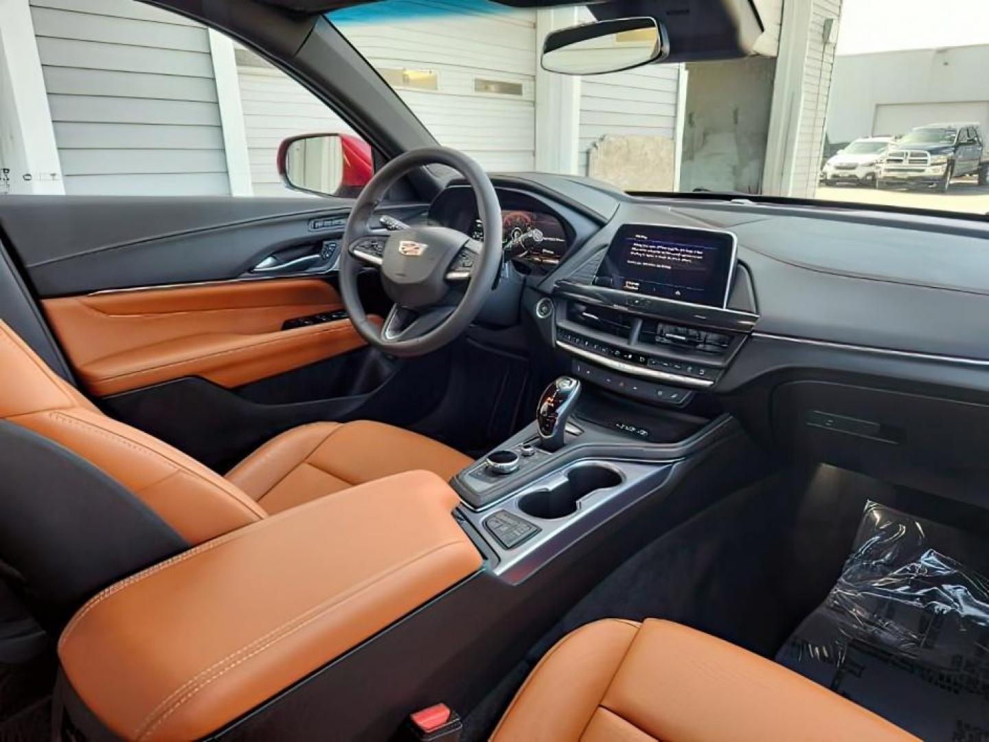 2022 Infrared Tintcoat /Cinnamon w/Jet Black Accents Cadillac CT4 (1G6DF5RL7N0) with an 27L L4 DOHC 16V TURBO engine, Automatic transmission, located at 1175 N Woodruff Ave, Idaho Falls, ID, 83401, 43.506901, -111.999657 - Wow, just wow!! This is one really nice car! It will check all the boxes- fuel efficient, powerful, AWD, comfortable, luxurious, great looking, roomy, fun to drive, the list goes on and on! It has all the driver safety options, heads up display, adjustable driving specs, navigation, Apple car play, - Photo#21