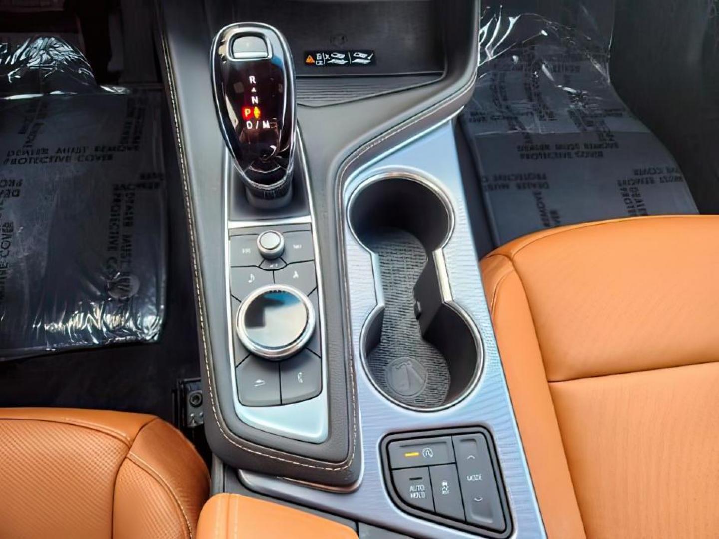 2022 Infrared Tintcoat /Cinnamon w/Jet Black Accents Cadillac CT4 (1G6DF5RL7N0) with an 27L L4 DOHC 16V TURBO engine, Automatic transmission, located at 1175 N Woodruff Ave, Idaho Falls, ID, 83401, 43.506901, -111.999657 - Wow, just wow!! This is one really nice car! It will check all the boxes- fuel efficient, powerful, AWD, comfortable, luxurious, great looking, roomy, fun to drive, the list goes on and on! It has all the driver safety options, heads up display, adjustable driving specs, navigation, Apple car play, - Photo#32
