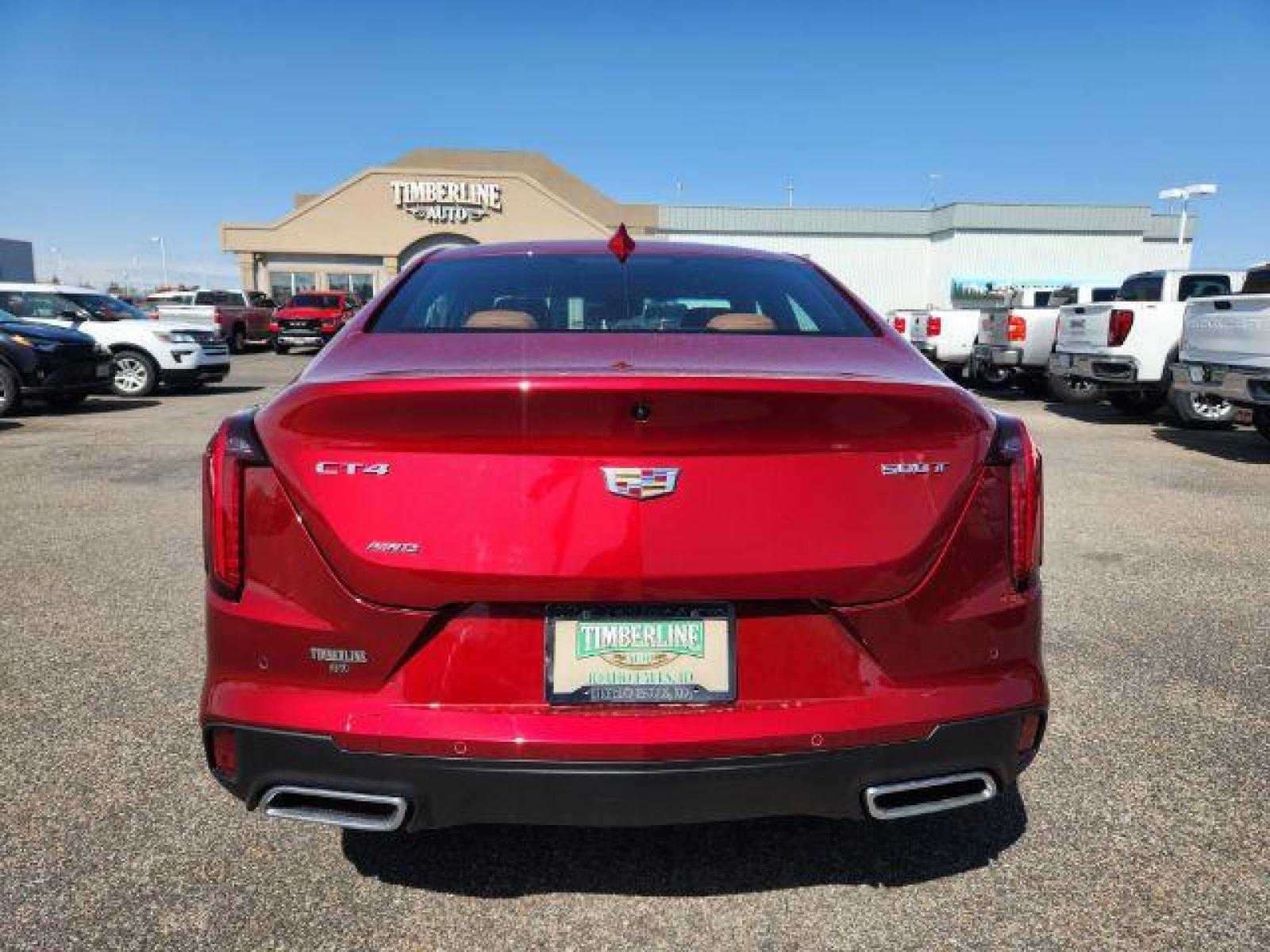 2022 Infrared Tintcoat /Cinnamon w/Jet Black Accents Cadillac CT4 Premium Luxury (1G6DF5RL7N0) with an 2.7L L4 DOHC 16V TURBO engine, 8-Speed Automatic transmission, located at 1235 N Woodruff Ave., Idaho Falls, 83401, (208) 523-1053, 43.507172, -112.000488 - Photo #4