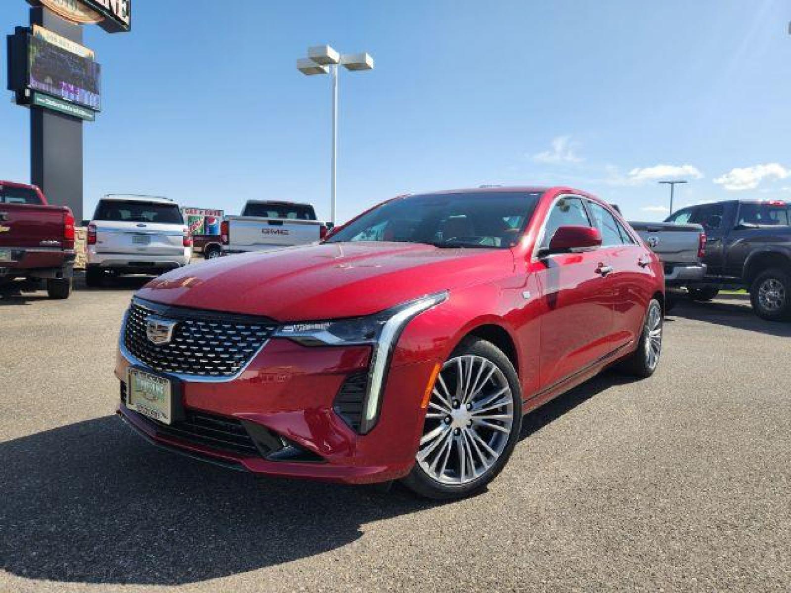 2022 Infrared Tintcoat /Cinnamon w/Jet Black Accents Cadillac CT4 Premium Luxury (1G6DF5RL7N0) with an 2.7L L4 DOHC 16V TURBO engine, 8-Speed Automatic transmission, located at 1235 N Woodruff Ave., Idaho Falls, 83401, (208) 523-1053, 43.507172, -112.000488 - Wow, just wow!! This is one really nice car! It will check all the boxes- fuel efficient, powerful, AWD, comfortable, luxurious, great looking, roomy, fun to drive, the list goes on and on! It has all the driver safety options, heads up display, adjustable driving specs, navigation, Apple car play, - Photo #1