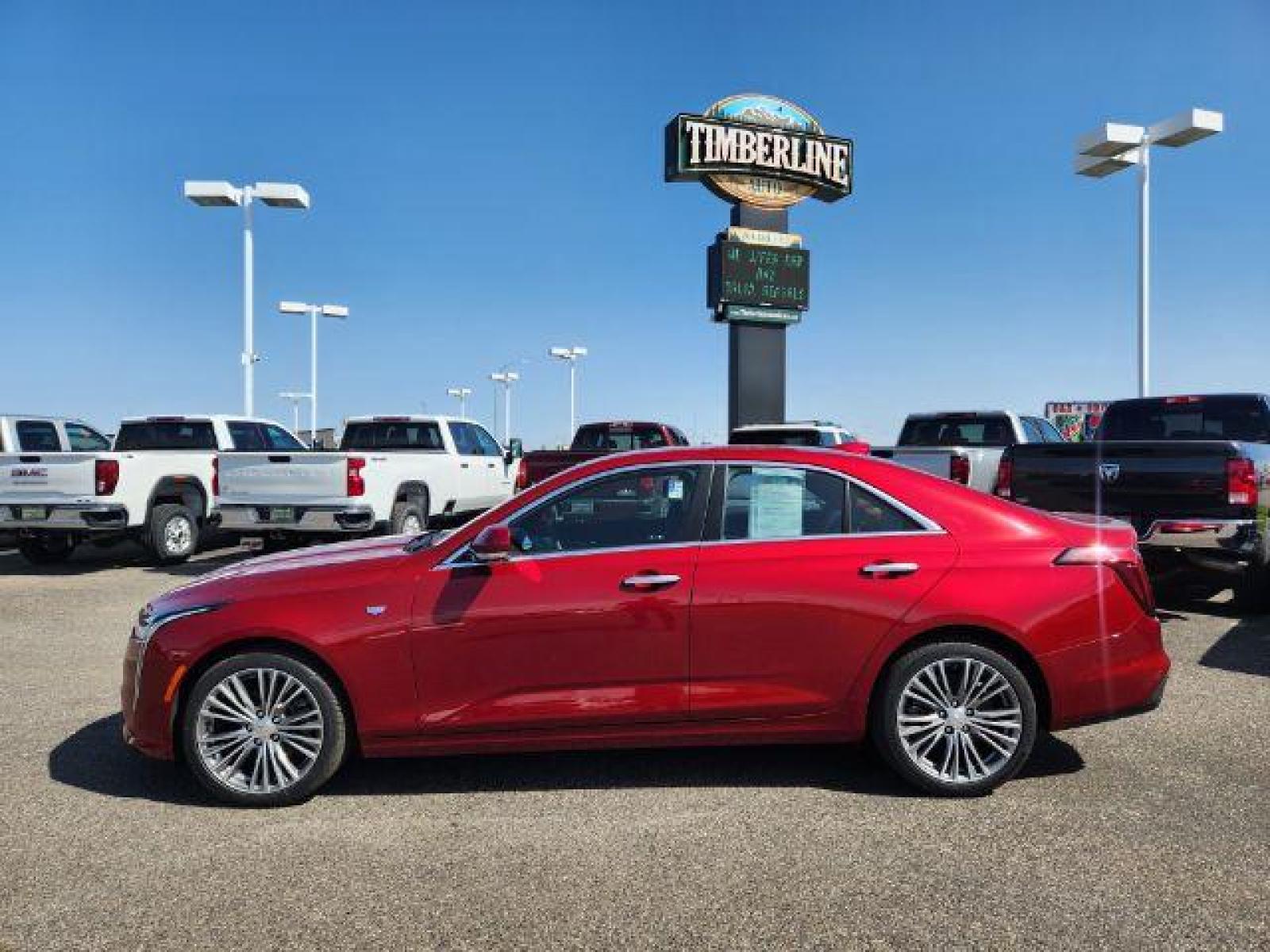2022 Infrared Tintcoat /Cinnamon w/Jet Black Accents Cadillac CT4 Premium Luxury (1G6DF5RL7N0) with an 2.7L L4 DOHC 16V TURBO engine, 8-Speed Automatic transmission, located at 1235 N Woodruff Ave., Idaho Falls, 83401, (208) 523-1053, 43.507172, -112.000488 - Wow, just wow!! This is one really nice car! It will check all the boxes- fuel efficient, powerful, AWD, comfortable, luxurious, great looking, roomy, fun to drive, the list goes on and on! It has all the driver safety options, heads up display, adjustable driving specs, navigation, Apple car play, - Photo #2