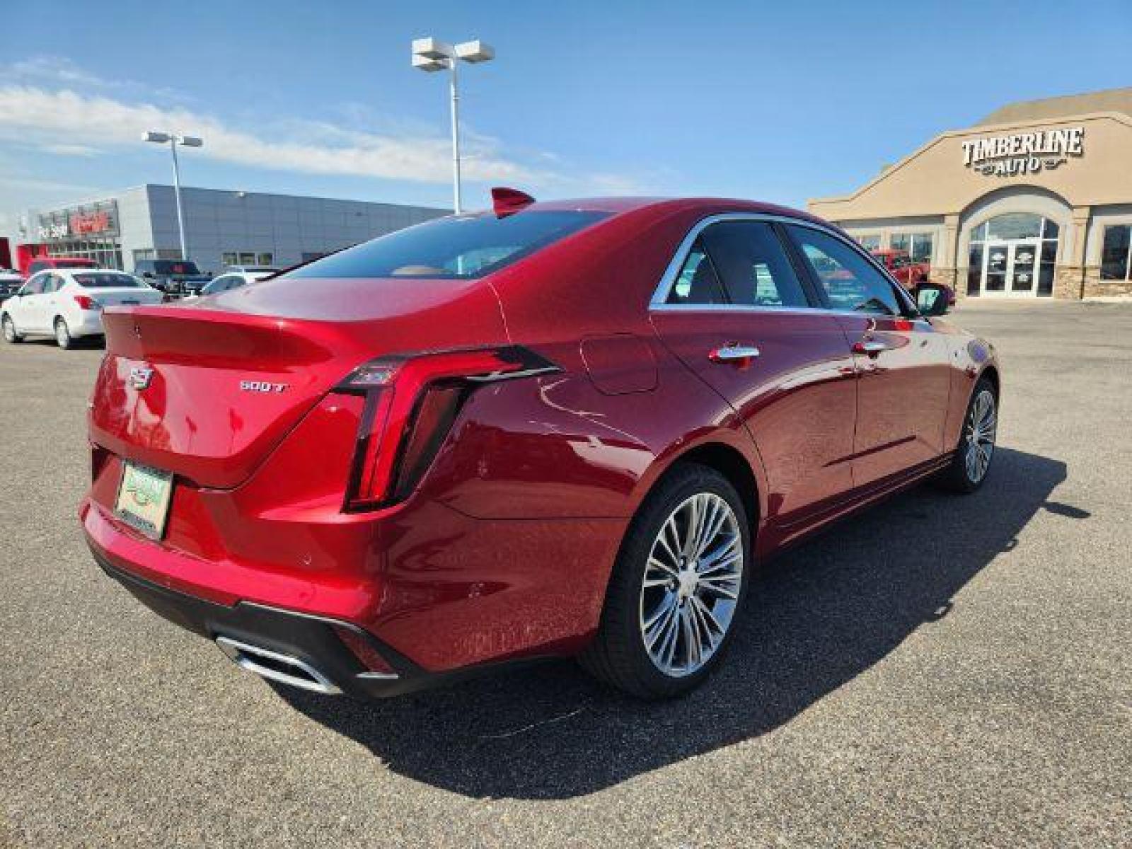 2022 Infrared Tintcoat /Cinnamon w/Jet Black Accents Cadillac CT4 Premium Luxury (1G6DF5RL7N0) with an 2.7L L4 DOHC 16V TURBO engine, 8-Speed Automatic transmission, located at 1235 N Woodruff Ave., Idaho Falls, 83401, (208) 523-1053, 43.507172, -112.000488 - Wow, just wow!! This is one really nice car! It will check all the boxes- fuel efficient, powerful, AWD, comfortable, luxurious, great looking, roomy, fun to drive, the list goes on and on! It has all the driver safety options, heads up display, adjustable driving specs, navigation, Apple car play, - Photo #5