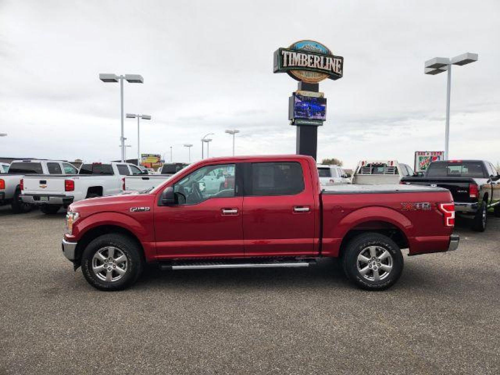2019 Ruby Red Metallic Tinted Clear Coat /Medium Earth Gray, cloth Ford F-150 XLT SuperCrew 5.5-ft. Bed 4WD (1FTEW1EP4KK) with an 2.7L V6 DOHC 24V engine, Automatic transmission, located at 1235 N Woodruff Ave., Idaho Falls, 83401, (208) 523-1053, 43.507172, -112.000488 - Here is your new pre-owned 2019 Ford F-150 XLT with low miles! This pickup is as clean today as it was the day it rolled off of the assembly line! The SuperCrew has all the leg room you need and then some! Your vehicle comes with near new GOOD YEAR WRANGLER tires with 95% tread left on them. Come on - Photo #2