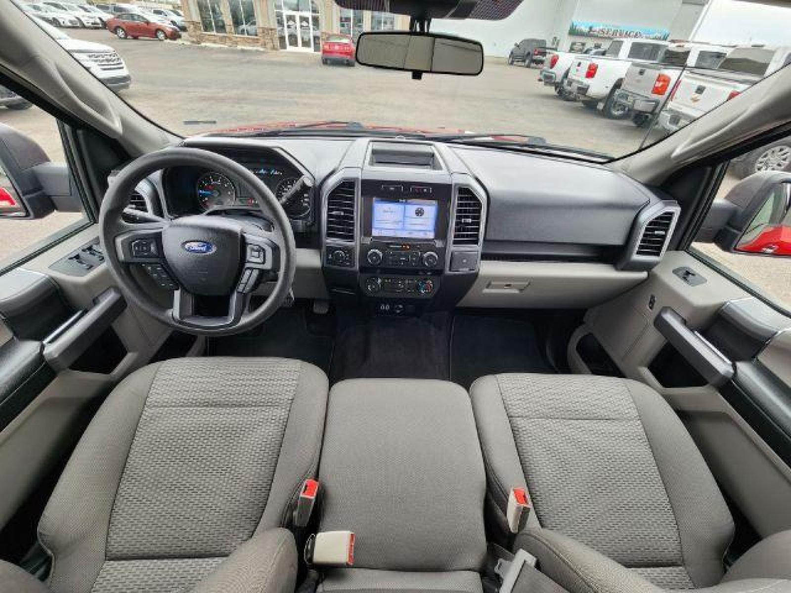 2019 Ruby Red Metallic Tinted Clear Coat /Medium Earth Gray, cloth Ford F-150 XLT SuperCrew 5.5-ft. Bed 4WD (1FTEW1EP4KK) with an 2.7L V6 DOHC 24V engine, Automatic transmission, located at 1235 N Woodruff Ave., Idaho Falls, 83401, (208) 523-1053, 43.507172, -112.000488 - Here is your new pre-owned 2019 Ford F-150 XLT with low miles! This pickup is as clean today as it was the day it rolled off of the assembly line! The SuperCrew has all the leg room you need and then some! Your vehicle comes with near new GOOD YEAR WRANGLER tires with 95% tread left on them. Come on - Photo #21