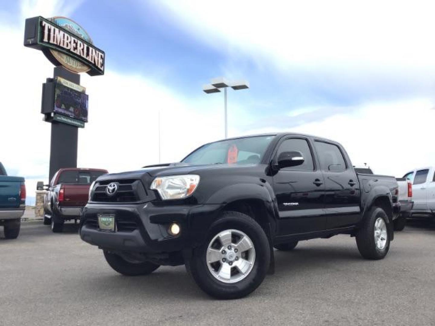 2015 Black /Gray, cloth Toyota Tacoma TRD SPORT Double Cab (3TMLU4EN8FM) with an 4.0L V6 DOHC 24V engine, Automatic transmission, located at 1235 N Woodruff Ave., Idaho Falls, 83401, (208) 523-1053, 43.507172, -112.000488 - Here's your chance at one of the most popular vehicles on the market! This Tacoma is in great shape inside and out! The TRD-SPORT gives you the color matched bumpers, the bigger display, and a few other goodies! The bed has a factory liner and the interior has rubber floor mats in the front with clo - Photo#0