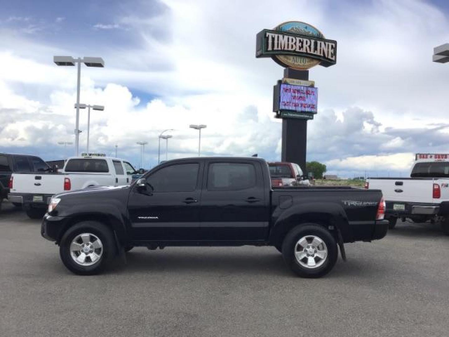 2015 Black /Gray, cloth Toyota Tacoma TRD SPORT Double Cab (3TMLU4EN8FM) with an 4.0L V6 DOHC 24V engine, Automatic transmission, located at 1235 N Woodruff Ave., Idaho Falls, 83401, (208) 523-1053, 43.507172, -112.000488 - Here's your chance at one of the most popular vehicles on the market! This Tacoma is in great shape inside and out! The TRD-SPORT gives you the color matched bumpers, the bigger display, and a few other goodies! The bed has a factory liner and the interior has rubber floor mats in the front with clo - Photo#2