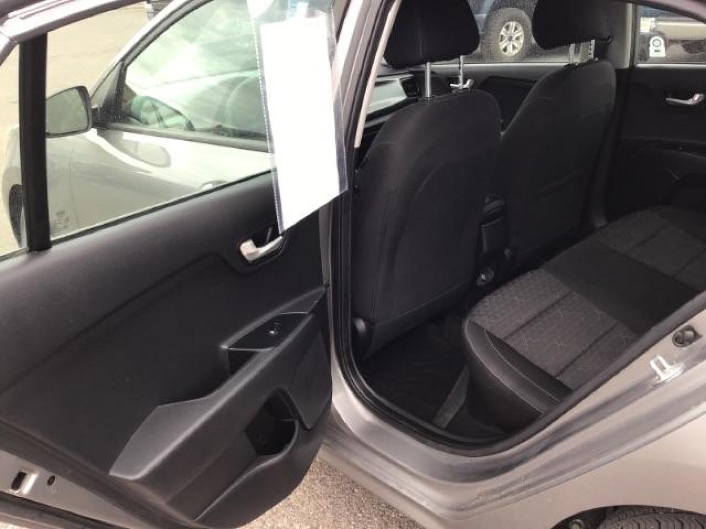 2021 Gray /Gray Kia Rio S (3KPA24AD7ME) with an 1.6L L4 DOHC 16V engine, 6-Speed Automatic transmission, located at 1235 N Woodruff Ave., Idaho Falls, 83401, (208) 523-1053, 43.507172, -112.000488 - Photo#12