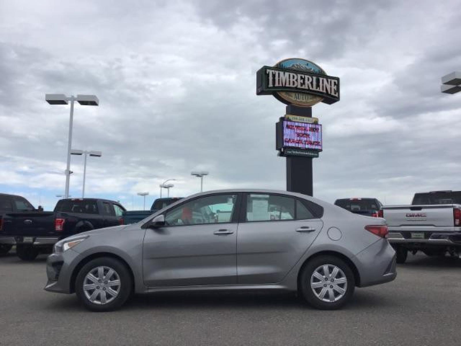 2021 Gray /Gray Kia Rio S (3KPA24AD7ME) with an 1.6L L4 DOHC 16V engine, 6-Speed Automatic transmission, located at 1235 N Woodruff Ave., Idaho Falls, 83401, (208) 523-1053, 43.507172, -112.000488 - Photo #2