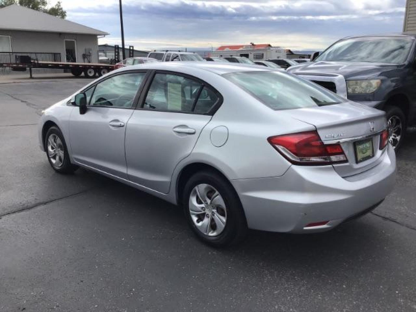 2013 Urban Titanium Metallic /Stone Cloth Interior Honda Civic LX Sedan 5-Speed AT (19XFB2F52DE) with an 1.8L L4 SOHC 16V engine, 5-Speed Automatic transmission, located at 1235 N Woodruff Ave., Idaho Falls, 83401, (208) 523-1053, 43.507172, -112.000488 - Photo #2