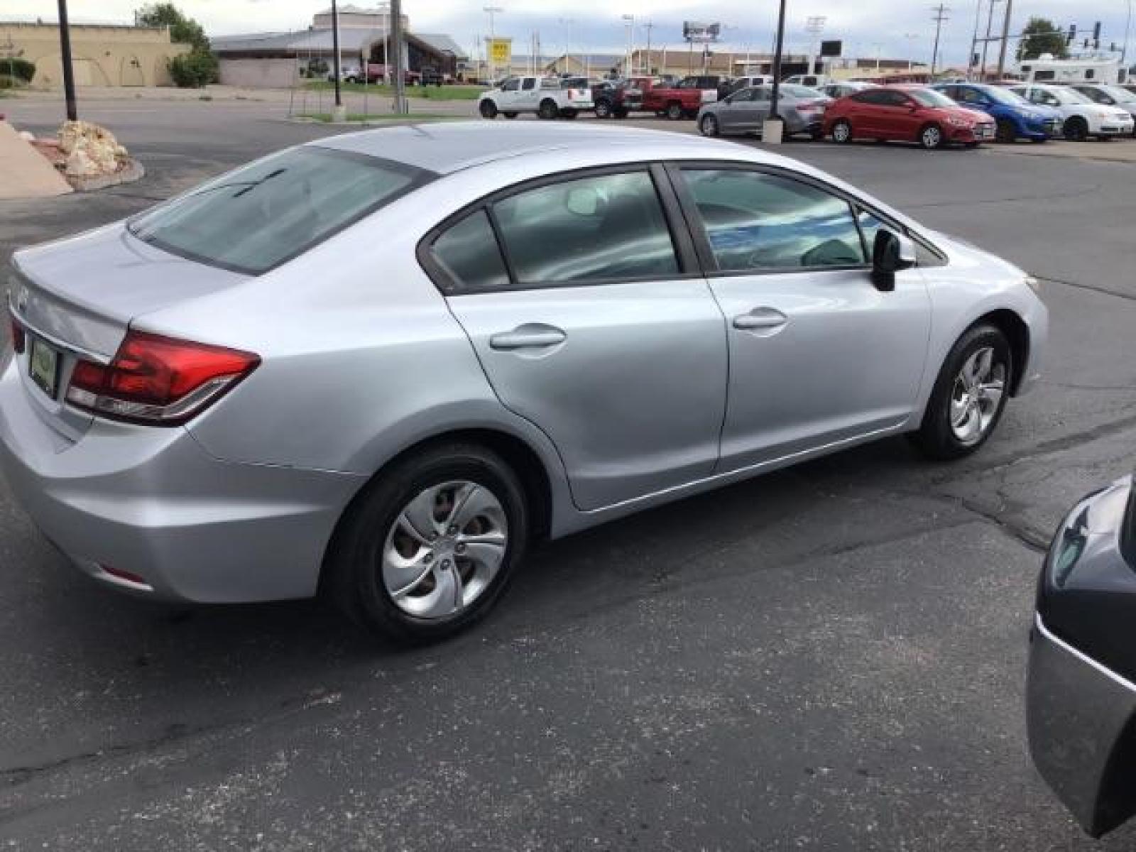 2013 Urban Titanium Metallic /Stone Cloth Interior Honda Civic LX Sedan 5-Speed AT (19XFB2F52DE) with an 1.8L L4 SOHC 16V engine, 5-Speed Automatic transmission, located at 1235 N Woodruff Ave., Idaho Falls, 83401, (208) 523-1053, 43.507172, -112.000488 - Photo #5