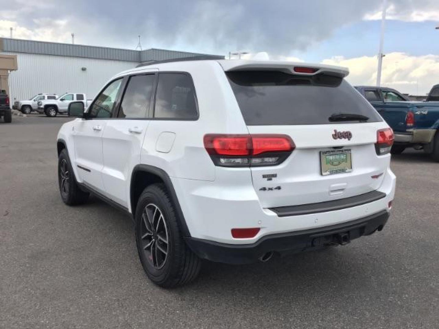 2020 Bright White Clear Coat /Black/Ruby Red, leather Jeep Grand Cherokee Trailhawk 4WD (1C4RJFLG5LC) with an 3.6L V6 DOHC 24V engine, 8-Speed Automatic transmission, located at 1235 N Woodruff Ave., Idaho Falls, 83401, (208) 523-1053, 43.507172, -112.000488 - Photo#2