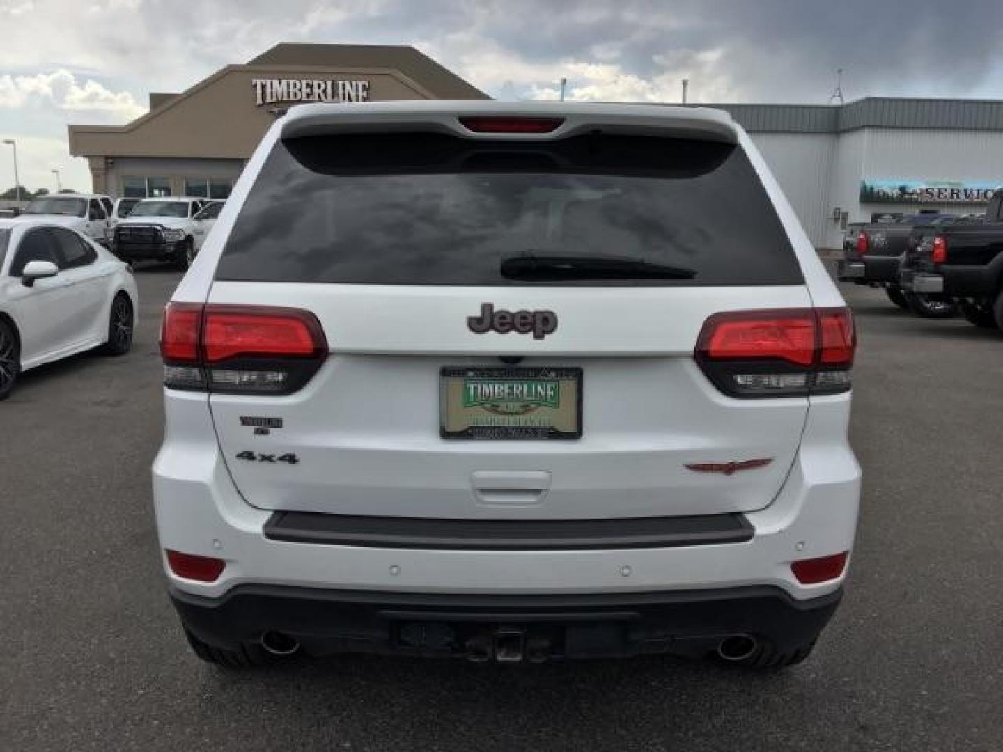 2020 Bright White Clear Coat /Black/Ruby Red, leather Jeep Grand Cherokee Trailhawk 4WD (1C4RJFLG5LC) with an 3.6L V6 DOHC 24V engine, 8-Speed Automatic transmission, located at 1235 N Woodruff Ave., Idaho Falls, 83401, (208) 523-1053, 43.507172, -112.000488 - Photo#3