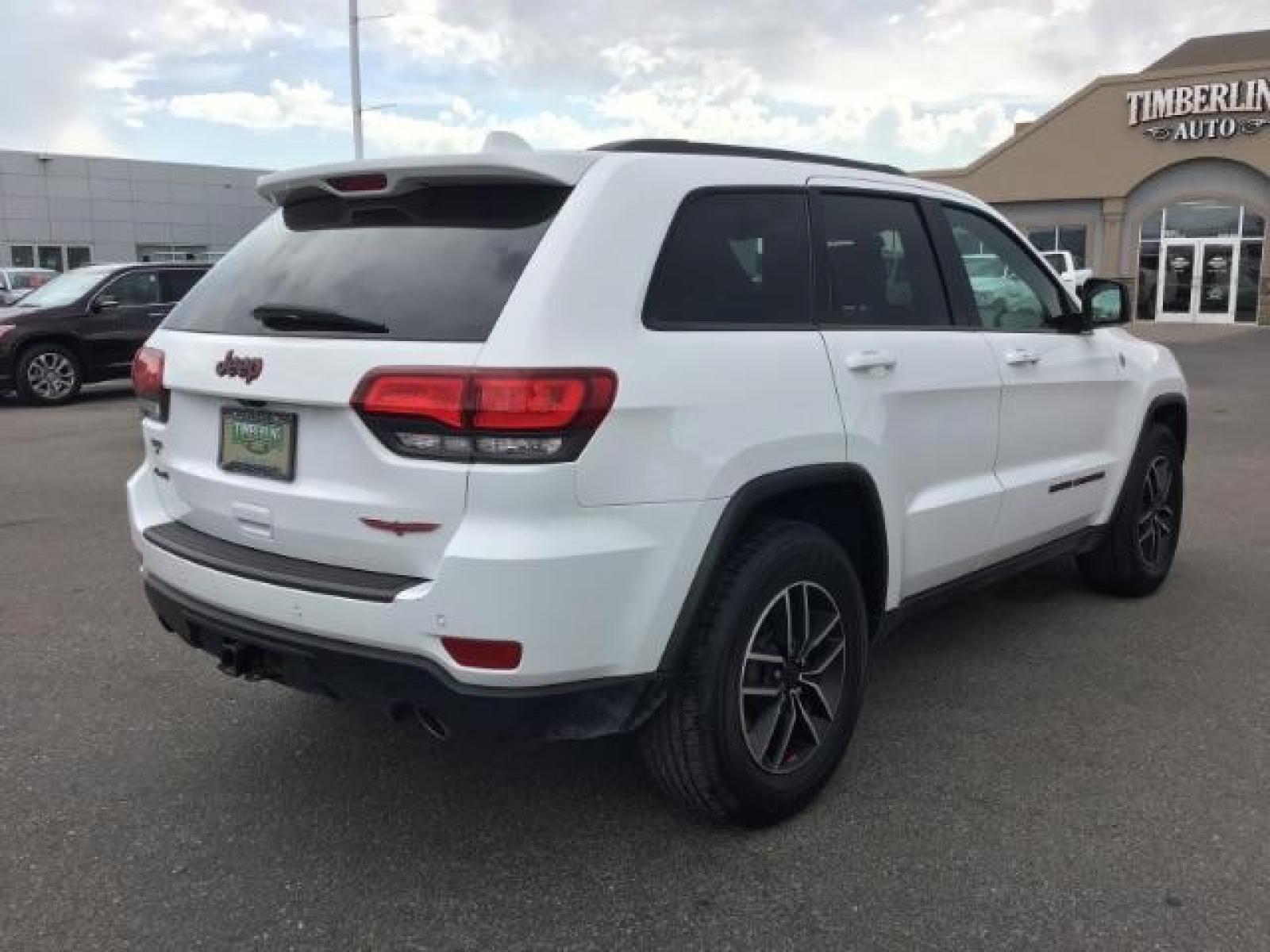 2020 Bright White Clear Coat /Black/Ruby Red, leather Jeep Grand Cherokee Trailhawk 4WD (1C4RJFLG5LC) with an 3.6L V6 DOHC 24V engine, 8-Speed Automatic transmission, located at 1235 N Woodruff Ave., Idaho Falls, 83401, (208) 523-1053, 43.507172, -112.000488 - Photo #4