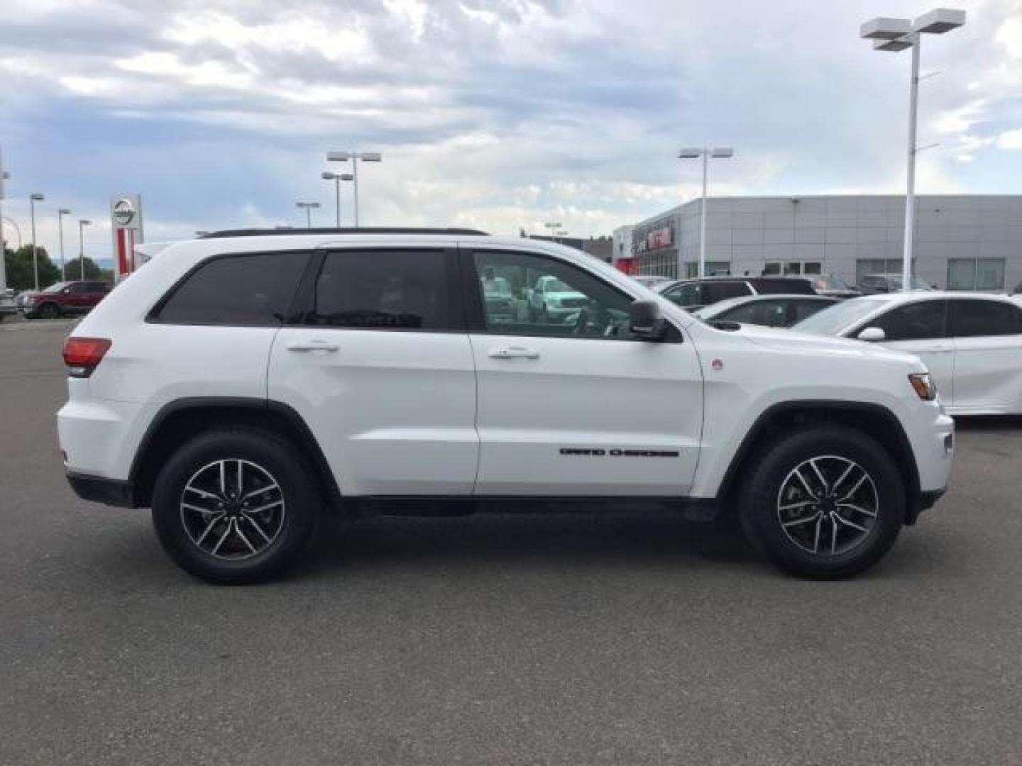 2020 Bright White Clear Coat /Black/Ruby Red, leather Jeep Grand Cherokee Trailhawk 4WD (1C4RJFLG5LC) with an 3.6L V6 DOHC 24V engine, 8-Speed Automatic transmission, located at 1235 N Woodruff Ave., Idaho Falls, 83401, (208) 523-1053, 43.507172, -112.000488 - Photo#5