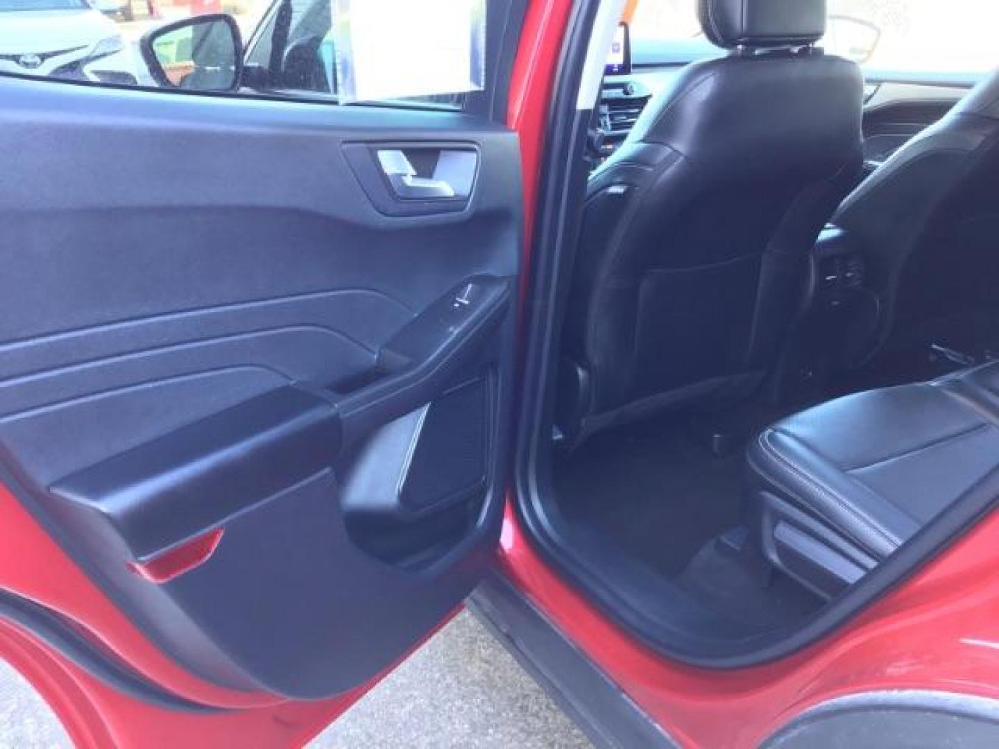 2021 Rapid Red Metallic Tinted Clearcoat /Ebony Ford Escape SEL AWD (1FMCU9H62MU) with an 1.5L L3 engine, 8-Speed Automatic transmission, located at 1235 N Woodruff Ave., Idaho Falls, 83401, (208) 523-1053, 43.507172, -112.000488 - 2021 Ford Escape SEL package with the 1.5L EcoBoost engine, heated seats, remote start, dual moonroof, and so much more! At Timberline Auto it is always easy to find a great deal on your next vehicle! Our experienced sales staff can help find the right vehicle that will fit your needs. Our knowled - Photo#13