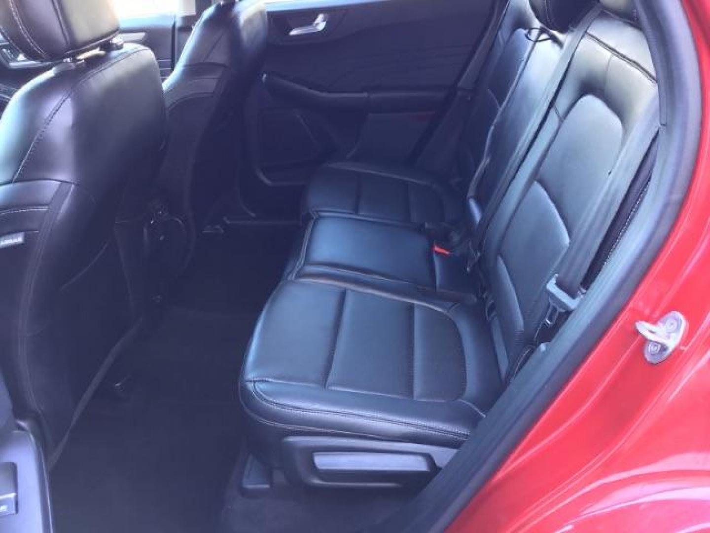2021 Rapid Red Metallic Tinted Clearcoat /Ebony Ford Escape SEL AWD (1FMCU9H62MU) with an 1.5L L3 engine, 8-Speed Automatic transmission, located at 1235 N Woodruff Ave., Idaho Falls, 83401, (208) 523-1053, 43.507172, -112.000488 - 2021 Ford Escape SEL package with the 1.5L EcoBoost engine, heated seats, remote start, dual moonroof, and so much more! At Timberline Auto it is always easy to find a great deal on your next vehicle! Our experienced sales staff can help find the right vehicle that will fit your needs. Our knowled - Photo#14