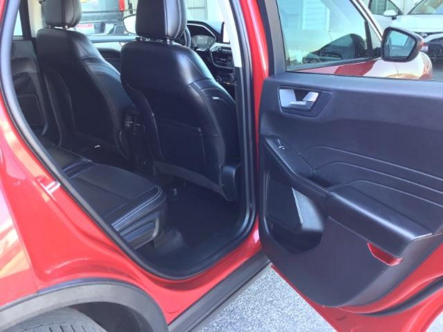 2021 Rapid Red Metallic Tinted Clearcoat /Ebony Ford Escape SEL AWD (1FMCU9H62MU) with an 1.5L L3 engine, 8-Speed Automatic transmission, located at 1235 N Woodruff Ave., Idaho Falls, 83401, (208) 523-1053, 43.507172, -112.000488 - 2021 Ford Escape SEL package with the 1.5L EcoBoost engine, heated seats, remote start, dual moonroof, and so much more! At Timberline Auto it is always easy to find a great deal on your next vehicle! Our experienced sales staff can help find the right vehicle that will fit your needs. Our knowled - Photo#17