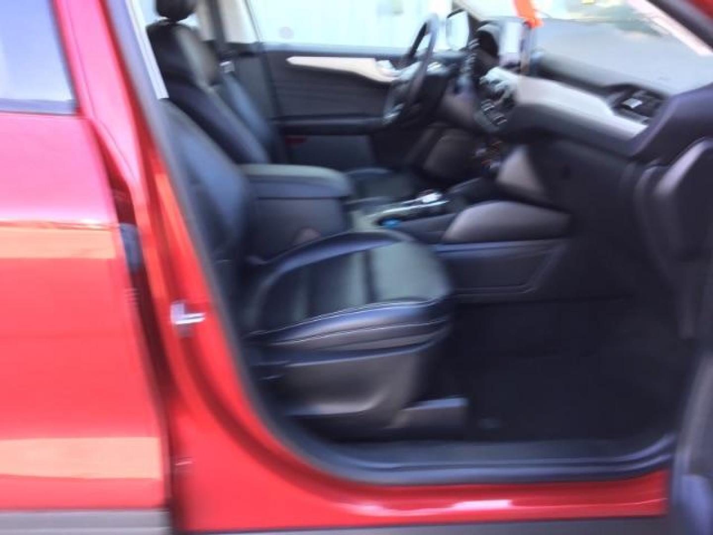 2021 Rapid Red Metallic Tinted Clearcoat /Ebony Ford Escape SEL AWD (1FMCU9H62MU) with an 1.5L L3 engine, 8-Speed Automatic transmission, located at 1235 N Woodruff Ave., Idaho Falls, 83401, (208) 523-1053, 43.507172, -112.000488 - 2021 Ford Escape SEL package with the 1.5L EcoBoost engine, heated seats, remote start, dual moonroof, and so much more! At Timberline Auto it is always easy to find a great deal on your next vehicle! Our experienced sales staff can help find the right vehicle that will fit your needs. Our knowled - Photo#20