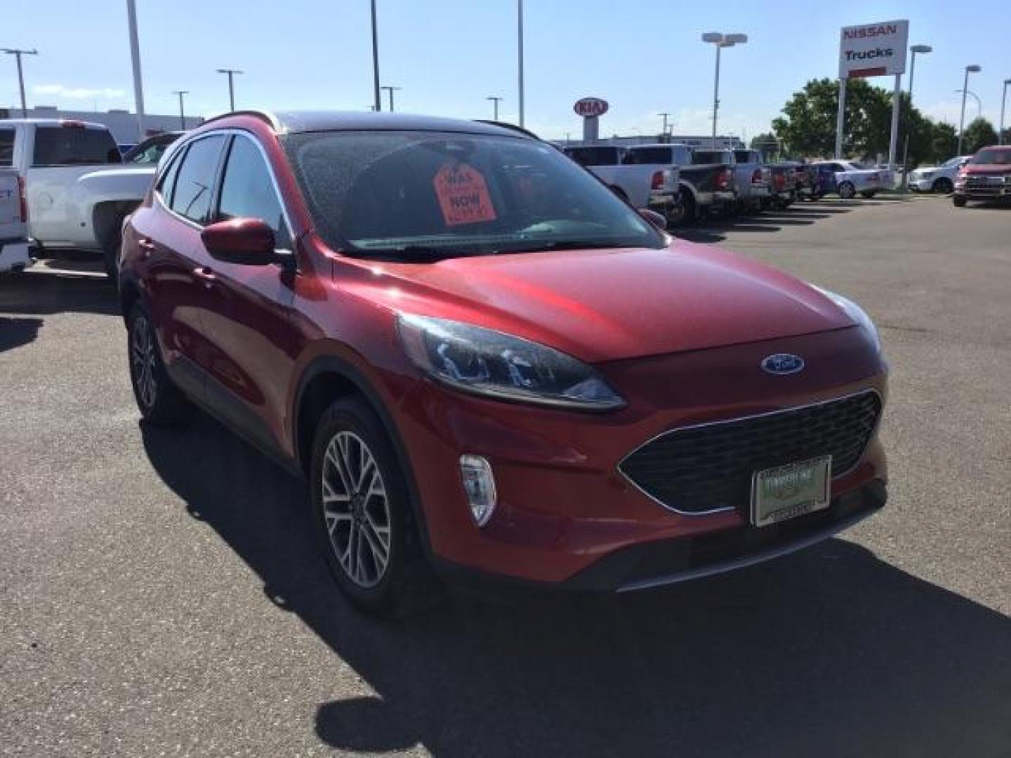 2021 Rapid Red Metallic Tinted Clearcoat /Ebony Ford Escape SEL AWD (1FMCU9H62MU) with an 1.5L L3 engine, 8-Speed Automatic transmission, located at 1235 N Woodruff Ave., Idaho Falls, 83401, (208) 523-1053, 43.507172, -112.000488 - 2021 Ford Escape SEL package with the 1.5L EcoBoost engine, heated seats, remote start, dual moonroof, and so much more! At Timberline Auto it is always easy to find a great deal on your next vehicle! Our experienced sales staff can help find the right vehicle that will fit your needs. Our knowled - Photo#7