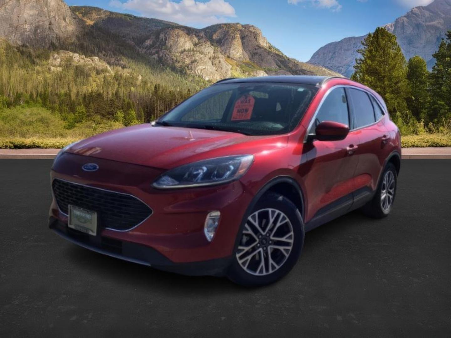 2021 Rapid Red Metallic Tinted Clearcoat /Ebony Ford Escape (1FMCU9H62MU) with an 15L L3 engine, Automatic transmission, located at 1175 N Woodruff Ave, Idaho Falls, ID, 83401, 43.506901, -111.999657 - 2021 Ford Escape SEL package with the 1.5L EcoBoost engine, heated seats, remote start, dual moonroof, and so much more! **At Timberline Auto it is always easy to find a great deal on your next vehicle! Our experienced sales staff can help find the right vehicle that will fit your needs. Our knowl - Photo#1