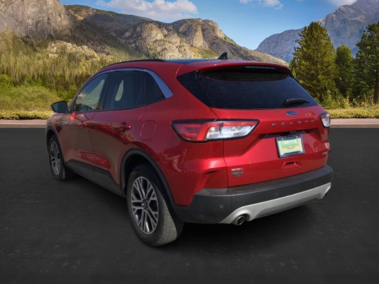2021 Rapid Red Metallic Tinted Clearcoat /Ebony Ford Escape (1FMCU9H62MU) with an 15L L3 engine, Automatic transmission, located at 1175 N Woodruff Ave, Idaho Falls, ID, 83401, 43.506901, -111.999657 - 2021 Ford Escape SEL package with the 1.5L EcoBoost engine, heated seats, remote start, dual moonroof, and so much more! **At Timberline Auto it is always easy to find a great deal on your next vehicle! Our experienced sales staff can help find the right vehicle that will fit your needs. Our knowl - Photo#3