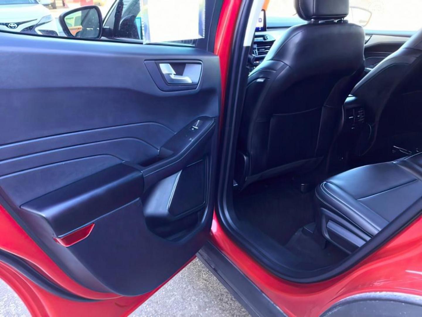 2021 Rapid Red Metallic Tinted Clearcoat /Ebony Ford Escape (1FMCU9H62MU) with an 15L L3 engine, Automatic transmission, located at 1175 N Woodruff Ave, Idaho Falls, ID, 83401, 43.506901, -111.999657 - 2021 Ford Escape SEL package with the 1.5L EcoBoost engine, heated seats, remote start, dual moonroof, and so much more! **At Timberline Auto it is always easy to find a great deal on your next vehicle! Our experienced sales staff can help find the right vehicle that will fit your needs. Our knowl - Photo#13
