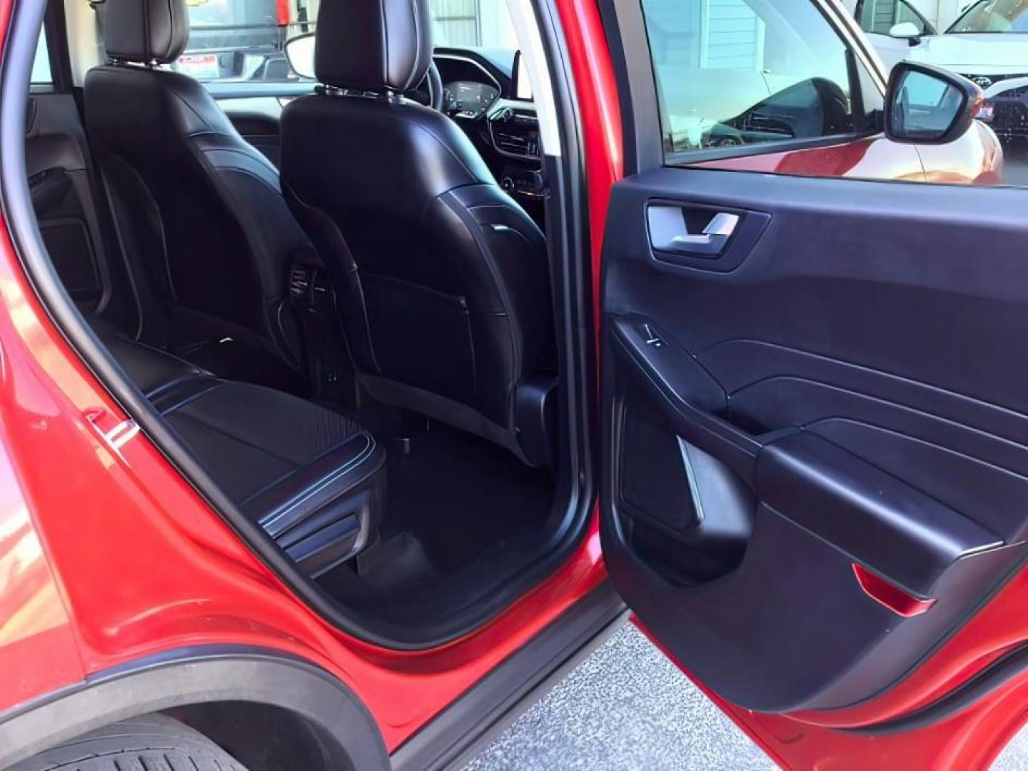 2021 Rapid Red Metallic Tinted Clearcoat /Ebony Ford Escape (1FMCU9H62MU) with an 15L L3 engine, Automatic transmission, located at 1175 N Woodruff Ave, Idaho Falls, ID, 83401, 43.506901, -111.999657 - 2021 Ford Escape SEL package with the 1.5L EcoBoost engine, heated seats, remote start, dual moonroof, and so much more! **At Timberline Auto it is always easy to find a great deal on your next vehicle! Our experienced sales staff can help find the right vehicle that will fit your needs. Our knowl - Photo#17
