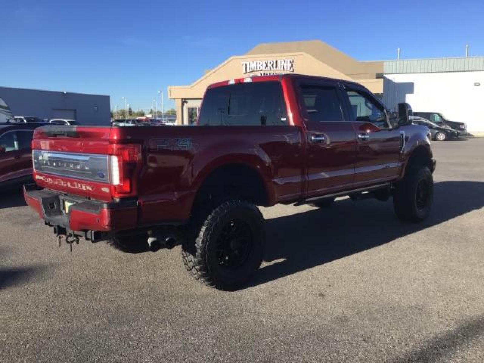 2018 RED /LEATHER Ford F-350 SD PLATINUM (1FT8W3BT4JE) with an 6.7 engine, AUTOMATIC transmission, located at 1235 N Woodruff Ave., Idaho Falls, 83401, (208) 523-1053, 43.507172, -112.000488 - This 2018 Ford F350 Platinum , has the 6.7L V8 diesel motor. Comes with retractable running boards, turnover ball, in the bed of the truck, push button start, navigation, lift kit, heated and cooled seats, sunroof, and bluetooth. At Timberline Auto it is always easy to find a great deal on your next - Photo #4
