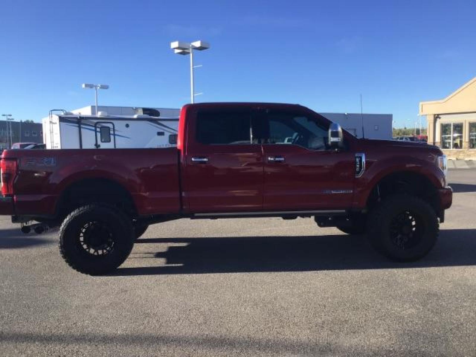 2018 RED /LEATHER Ford F-350 SD PLATINUM (1FT8W3BT4JE) with an 6.7 engine, AUTOMATIC transmission, located at 1235 N Woodruff Ave., Idaho Falls, 83401, (208) 523-1053, 43.507172, -112.000488 - This 2018 Ford F350 Platinum , has the 6.7L V8 diesel motor. Comes with retractable running boards, turnover ball, in the bed of the truck, push button start, navigation, lift kit, heated and cooled seats, sunroof, and bluetooth. At Timberline Auto it is always easy to find a great deal on your next - Photo #5