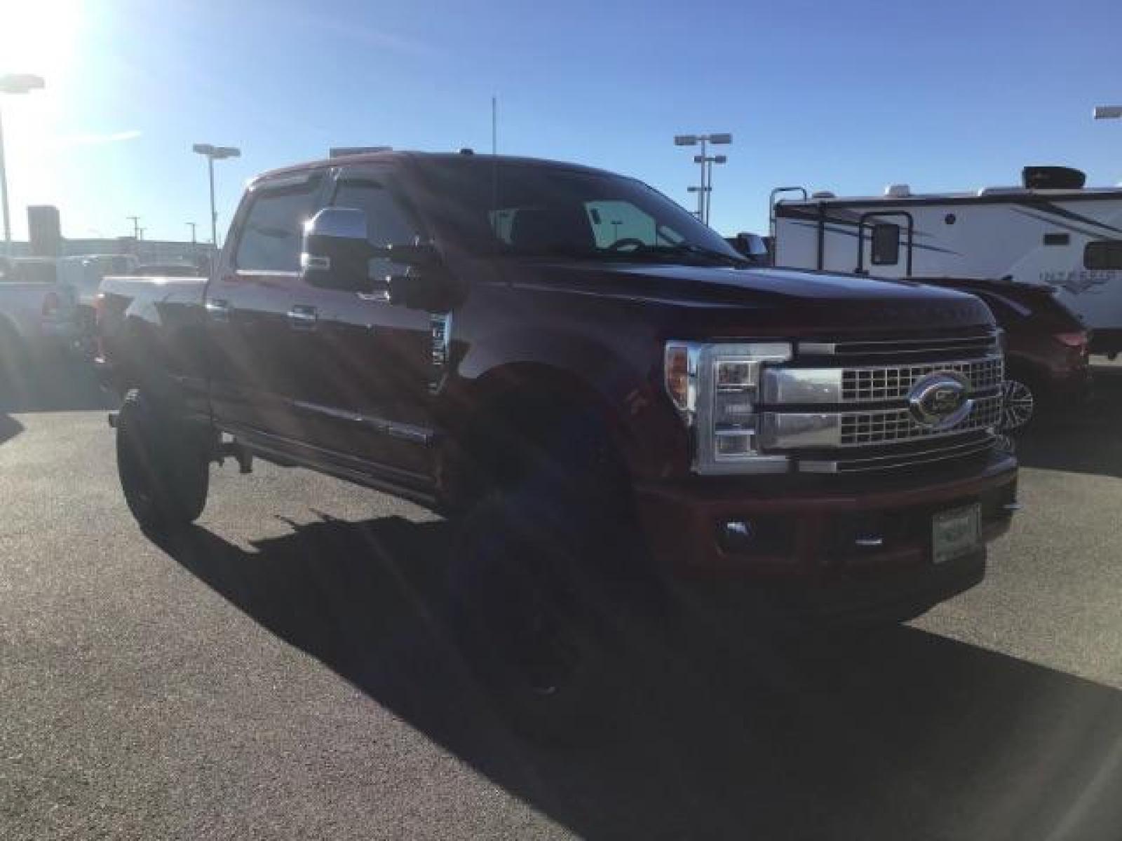 2018 RED /LEATHER Ford F-350 SD PLATINUM (1FT8W3BT4JE) with an 6.7 engine, AUTOMATIC transmission, located at 1235 N Woodruff Ave., Idaho Falls, 83401, (208) 523-1053, 43.507172, -112.000488 - This 2018 Ford F350 Platinum , has the 6.7L V8 diesel motor. Comes with retractable running boards, turnover ball, in the bed of the truck, push button start, navigation, lift kit, heated and cooled seats, sunroof, and bluetooth. At Timberline Auto it is always easy to find a great deal on your next - Photo #6