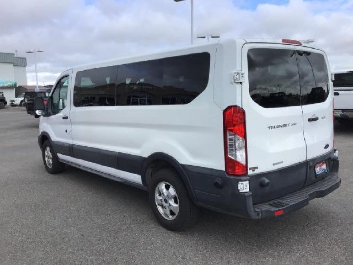 2018 WHITE /XL Ford Transit 350 Wagon Low Roof XL w/Sliding Pass. 148-in. WB (1FBZX2YG2JK) with an 3.5L V6 DOHC 24V engine, 6-Speed Automatic transmission, located at 1235 N Woodruff Ave., Idaho Falls, 83401, (208) 523-1053, 43.507172, -112.000488 - Photo#2