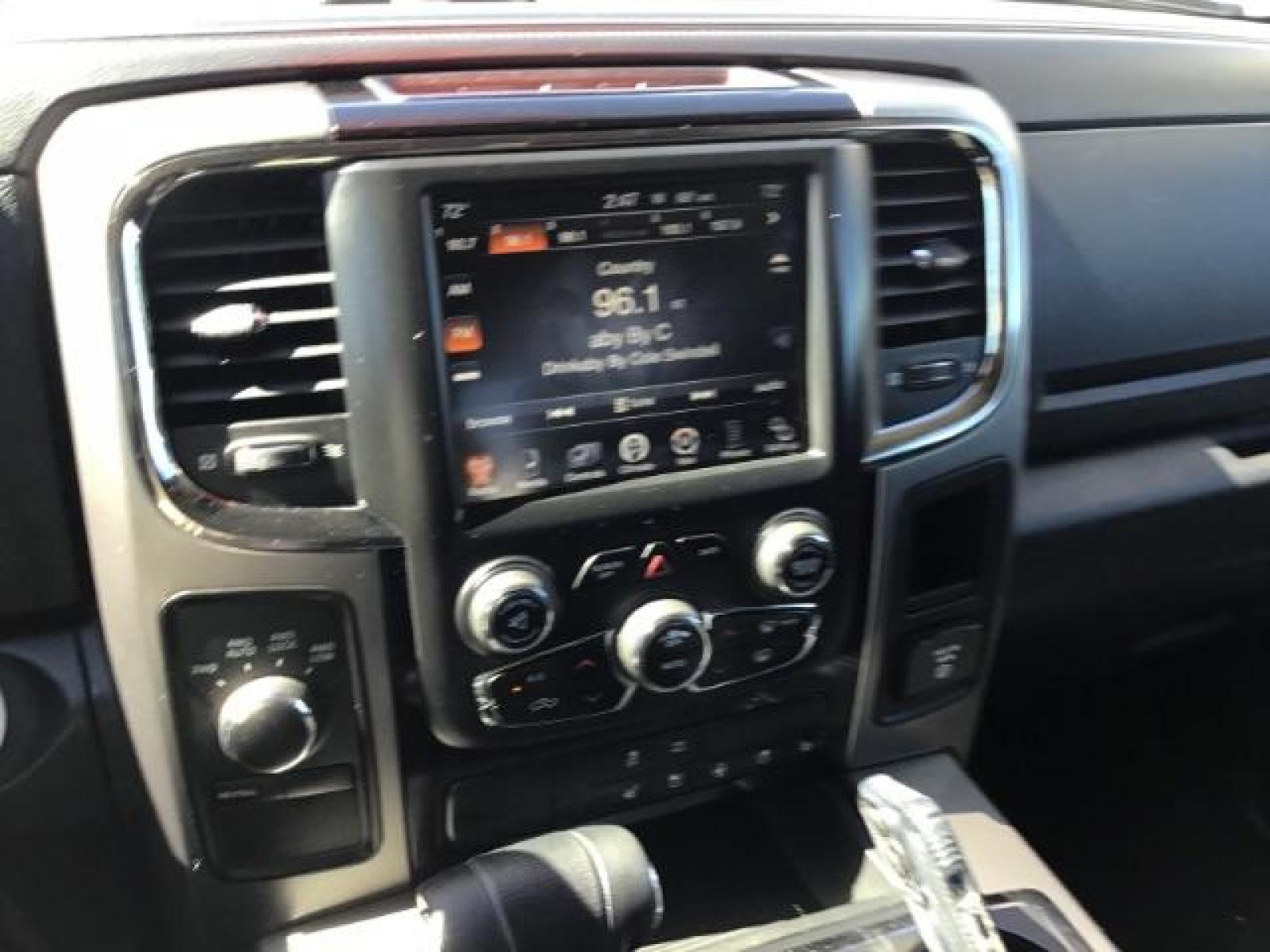 2013 Flame Red /Black Cloth Interior RAM 1500 Sport Quad Cab 4WD (1C6RR7HT4DS) with an 5.7L V8 OHV 16V engine, 6-Speed Automatic transmission, located at 1235 N Woodruff Ave., Idaho Falls, 83401, (208) 523-1053, 43.507172, -112.000488 - Leather, sport package, 4X4, Bluetooth, Alpine Sound System, heated and cooled seats, heated steering wheel, tow package, 6.6' bed, Tonneau cover. At Timberline Auto it is always easy to find a great deal on your next vehicle! Our experienced sales staff can help find the right vehicle that will fi - Photo #10