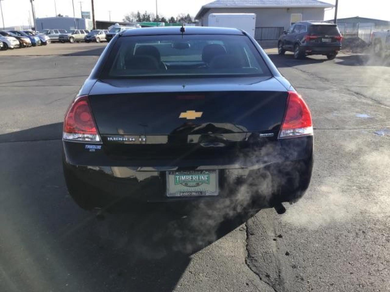 2015 BLACK /CLOTH Chevrolet Impala Limited LT (2G1WB5E30F1) with an 3.6L V6 DOHC 16V FFV engine, 6-Speed Automatic transmission, located at 1235 N Woodruff Ave., Idaho Falls, 83401, (208) 523-1053, 43.507172, -112.000488 - Photo #3