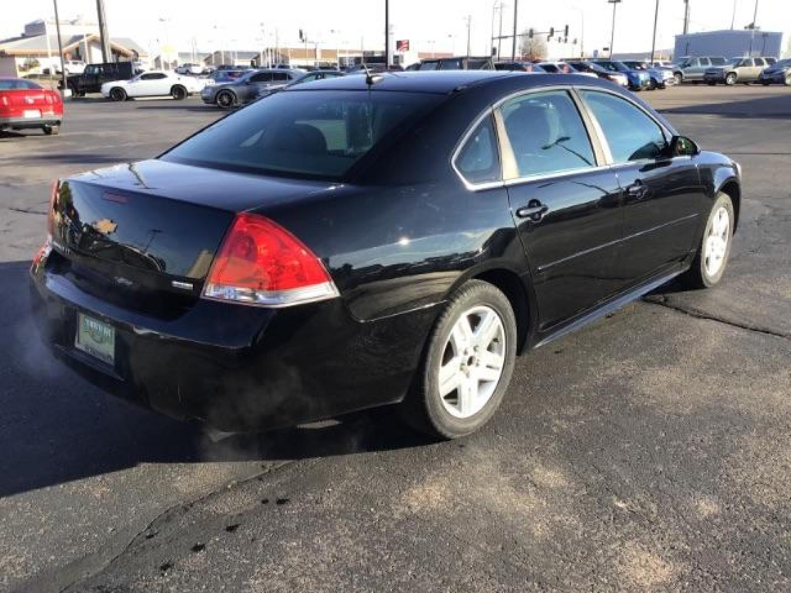 2015 BLACK /CLOTH Chevrolet Impala Limited LT (2G1WB5E30F1) with an 3.6L V6 DOHC 16V FFV engine, 6-Speed Automatic transmission, located at 1235 N Woodruff Ave., Idaho Falls, 83401, (208) 523-1053, 43.507172, -112.000488 - Photo #4