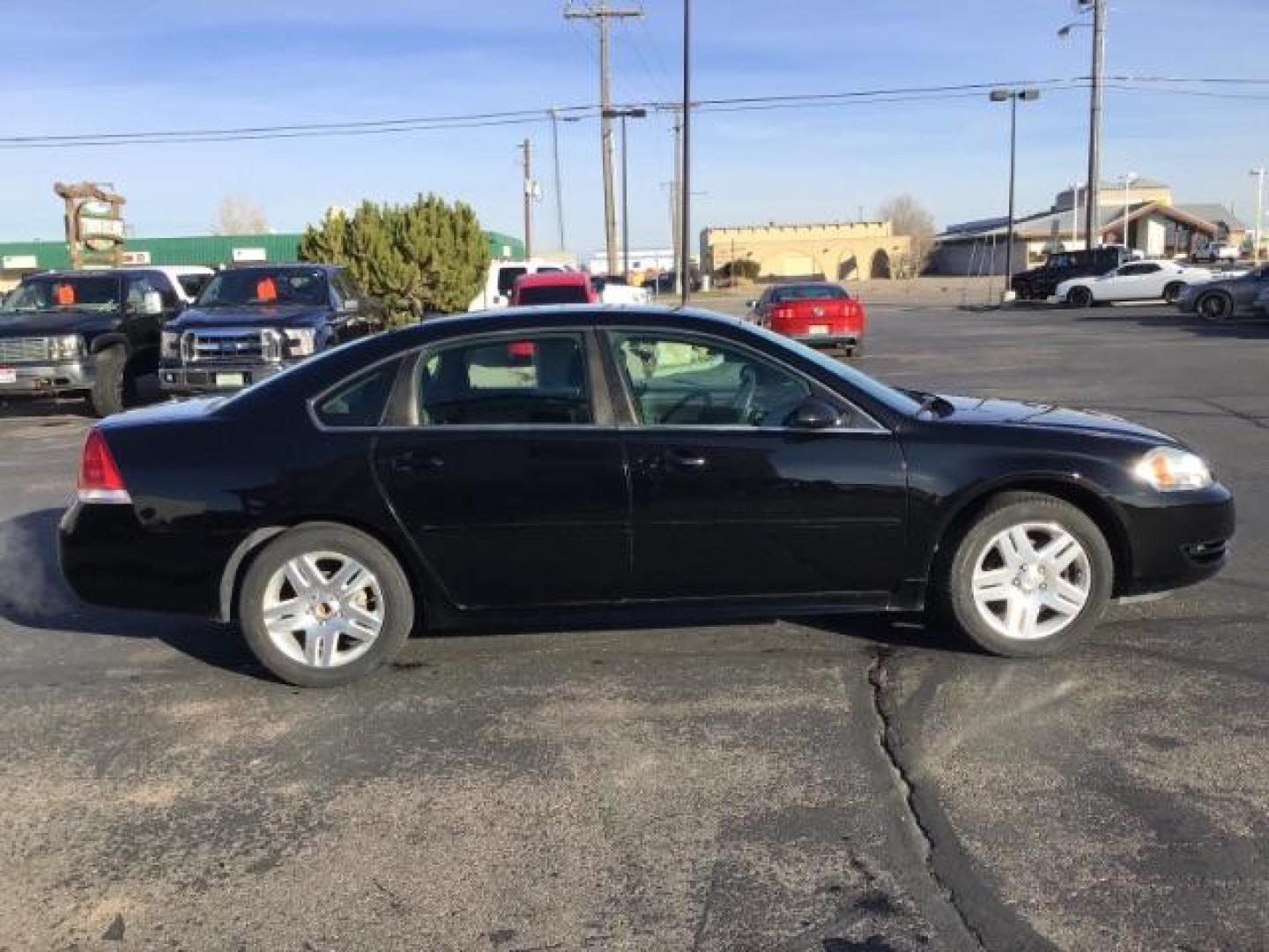 2015 BLACK /CLOTH Chevrolet Impala Limited LT (2G1WB5E30F1) with an 3.6L V6 DOHC 16V FFV engine, 6-Speed Automatic transmission, located at 1235 N Woodruff Ave., Idaho Falls, 83401, (208) 523-1053, 43.507172, -112.000488 - This 2015 Chevrolet Impala Limited, has 84,000 miles. It has cloth interior, cruise control, bluetooth audio, and AM/FM CD stereo. At Timberline Auto it is always easy to find a great deal on your next vehicle! Our experienced sales staff can help find the right vehicle will fit your needs. Our know - Photo#5