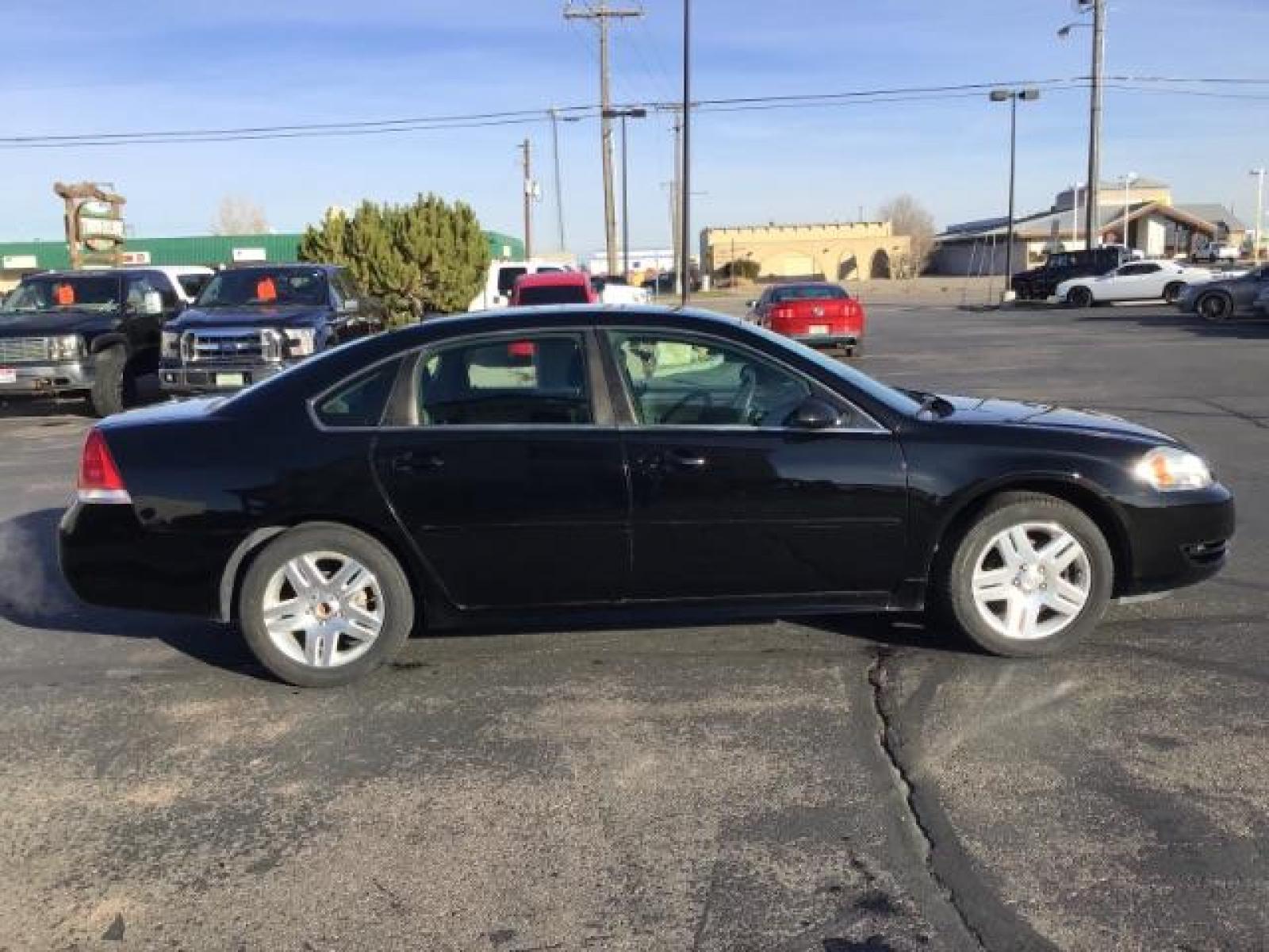 2015 BLACK /CLOTH Chevrolet Impala Limited LT (2G1WB5E30F1) with an 3.6L V6 DOHC 16V FFV engine, 6-Speed Automatic transmission, located at 1235 N Woodruff Ave., Idaho Falls, 83401, (208) 523-1053, 43.507172, -112.000488 - This 2015 Chevrolet Impala Limited, has 84,000 miles. It has cloth interior, cruise control, bluetooth audio, and AM/FM CD stereo. At Timberline Auto it is always easy to find a great deal on your next vehicle! Our experienced sales staff can help find the right vehicle will fit your needs. Our know - Photo #5