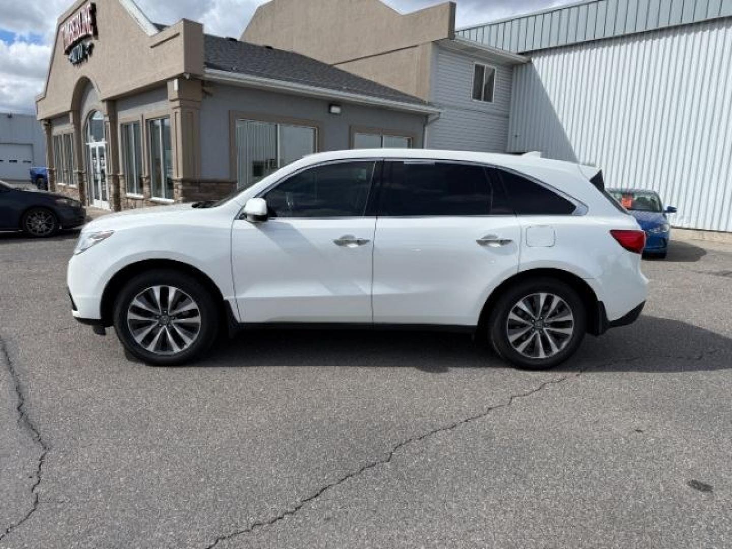 2016 WHITE /SH AWD Acura MDX (5FRYD4H4XGB) with an 35L V6 SOHC 24V engine, Automatic transmission, located at 1175 N Woodruff Ave, Idaho Falls, ID, 83401, 43.506901, -111.999657 - At Timberline Auto, finding a great deal on your next vehicle is always easy! Our experienced sales staff's goal is to help find you the right vehicle at the right price! Our knowledgeable finance department has options for almost any credit score. We offer extended service contract options to prote - Photo#32