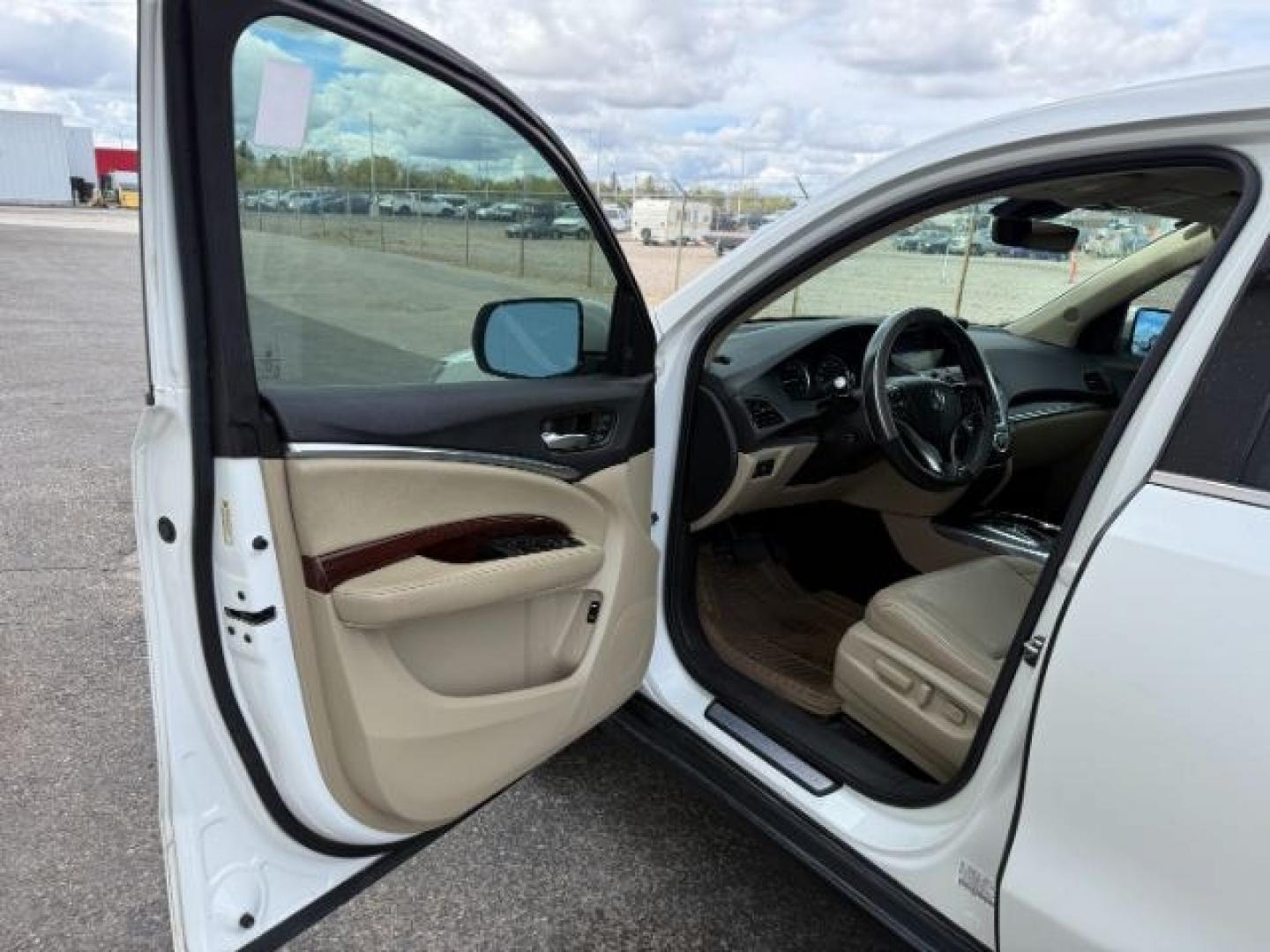 2016 WHITE /SH AWD Acura MDX (5FRYD4H4XGB) with an 35L V6 SOHC 24V engine, Automatic transmission, located at 1175 N Woodruff Ave, Idaho Falls, ID, 83401, 43.506901, -111.999657 - At Timberline Auto, finding a great deal on your next vehicle is always easy! Our experienced sales staff's goal is to help find you the right vehicle at the right price! Our knowledgeable finance department has options for almost any credit score. We offer extended service contract options to prote - Photo#45