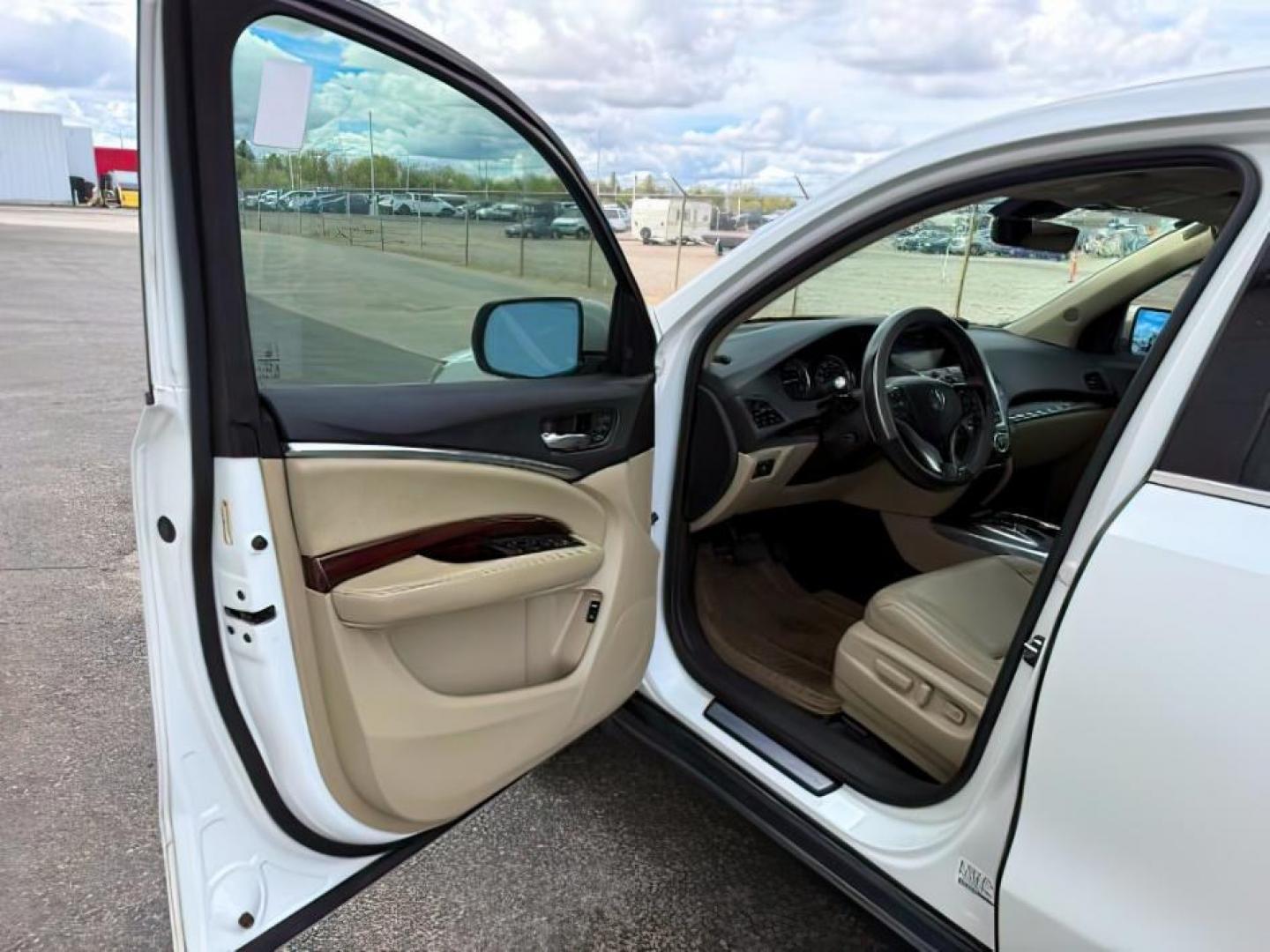 2016 WHITE /SH AWD Acura MDX (5FRYD4H4XGB) with an 35L V6 SOHC 24V engine, Automatic transmission, located at 1175 N Woodruff Ave, Idaho Falls, ID, 83401, 43.506901, -111.999657 - At Timberline Auto, finding a great deal on your next vehicle is always easy! Our experienced sales staff's goal is to help find you the right vehicle at the right price! Our knowledgeable finance department has options for almost any credit score. We offer extended service contract options to prote - Photo#14