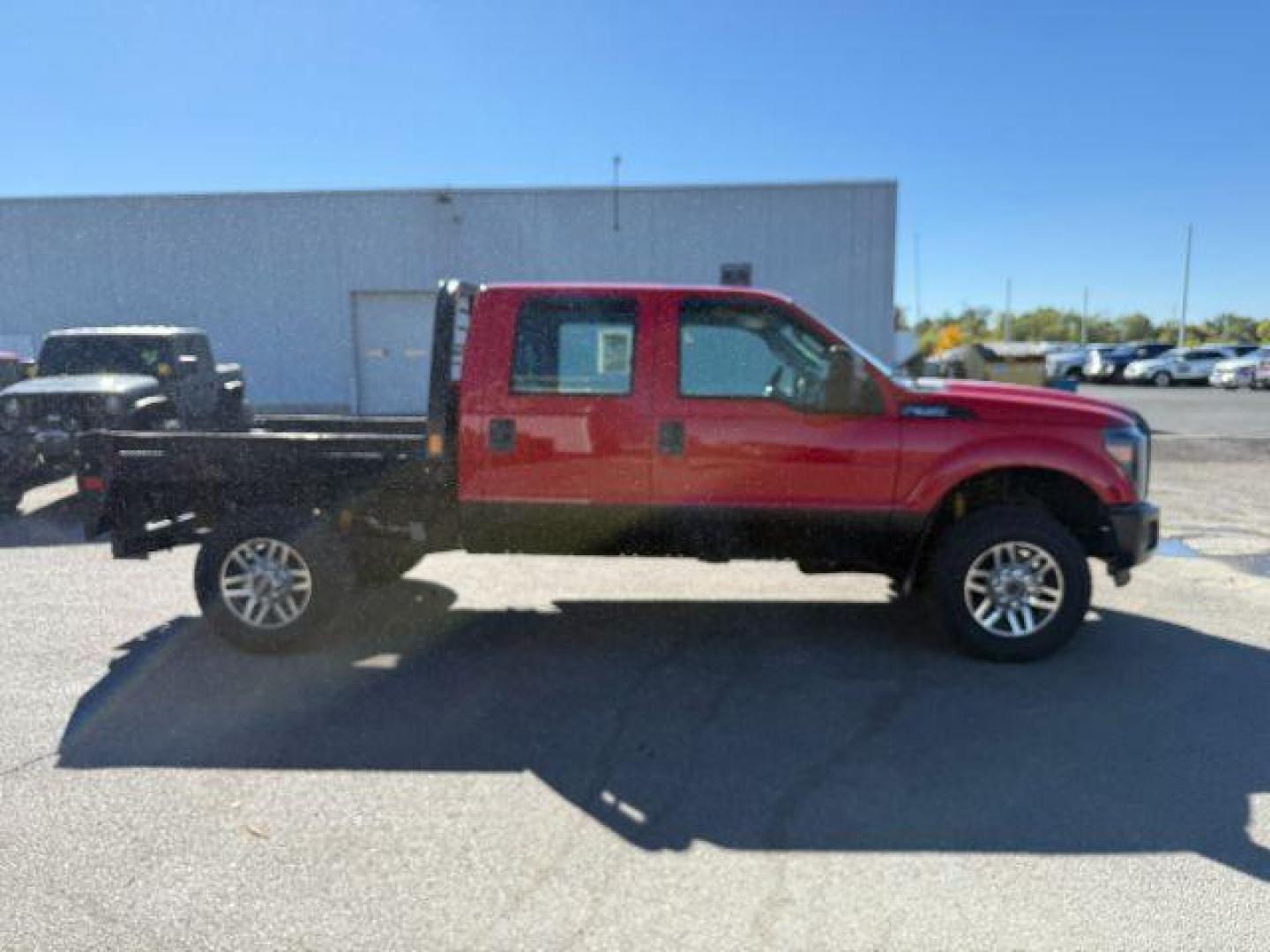 2013 Vermillion Red /Steel Cloth Interior Ford F-350 SD (1FT8W3B60DE) with an 62L V8 OHV 16V engine, Automatic transmission, located at 1175 N Woodruff Ave, Idaho Falls, ID, 83401, 43.506901, -111.999657 - At Timberline Auto, finding a great deal on your next vehicle is always easy! Our experienced sales staff's goal is to help find you the right vehicle at the right price! Our knowledgeable finance department has options for almost any credit score. We offer extended service contract options to prote - Photo#24