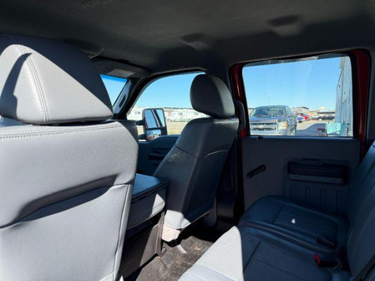 2013 Vermillion Red /Steel Cloth Interior Ford F-350 SD (1FT8W3B60DE) with an 62L V8 OHV 16V engine, Automatic transmission, located at 1175 N Woodruff Ave, Idaho Falls, ID, 83401, 43.506901, -111.999657 - At Timberline Auto, finding a great deal on your next vehicle is always easy! Our experienced sales staff's goal is to help find you the right vehicle at the right price! Our knowledgeable finance department has options for almost any credit score. We offer extended service contract options to prote - Photo#36