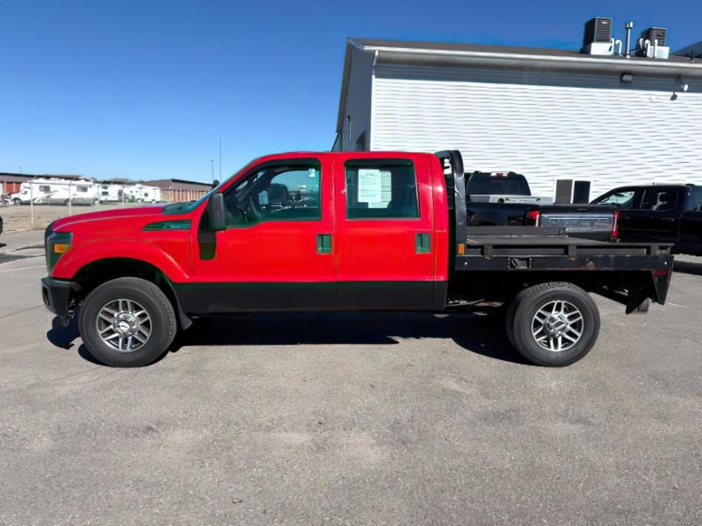 2013 Vermillion Red /Steel Cloth Interior Ford F-350 SD (1FT8W3B60DE) with an 62L V8 OHV 16V engine, Automatic transmission, located at 1175 N Woodruff Ave, Idaho Falls, ID, 83401, 43.506901, -111.999657 - At Timberline Auto, finding a great deal on your next vehicle is always easy! Our experienced sales staff's goal is to help find you the right vehicle at the right price! Our knowledgeable finance department has options for almost any credit score. We offer extended service contract options to prote - Photo#1