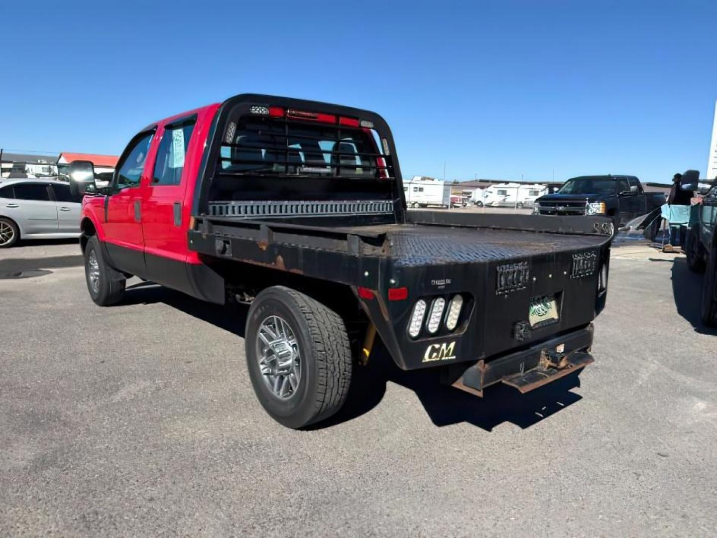 2013 Vermillion Red /Steel Cloth Interior Ford F-350 SD (1FT8W3B60DE) with an 62L V8 OHV 16V engine, Automatic transmission, located at 1175 N Woodruff Ave, Idaho Falls, ID, 83401, 43.506901, -111.999657 - At Timberline Auto, finding a great deal on your next vehicle is always easy! Our experienced sales staff's goal is to help find you the right vehicle at the right price! Our knowledgeable finance department has options for almost any credit score. We offer extended service contract options to prote - Photo#2