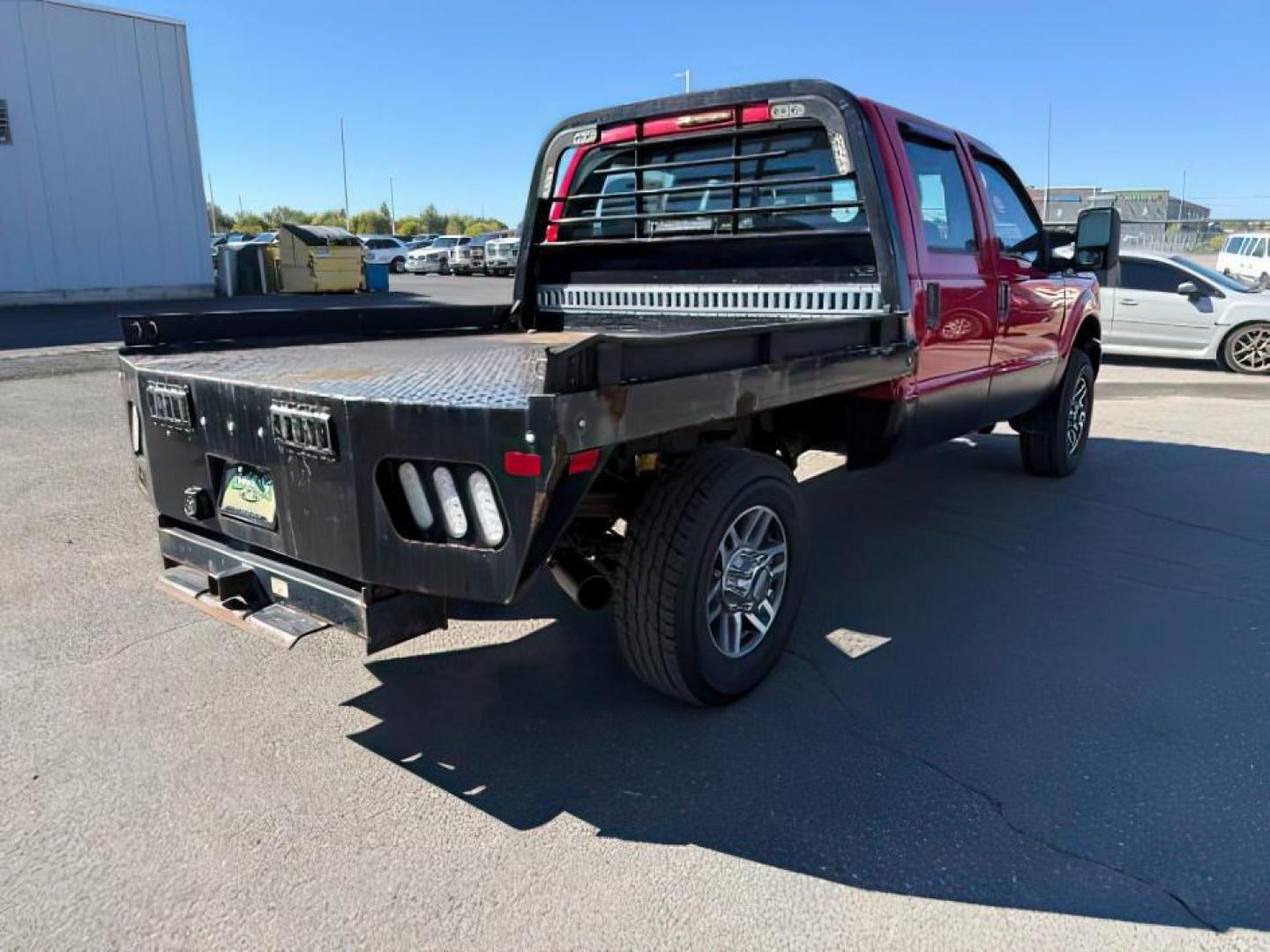 2013 Vermillion Red /Steel Cloth Interior Ford F-350 SD (1FT8W3B60DE) with an 62L V8 OHV 16V engine, Automatic transmission, located at 1175 N Woodruff Ave, Idaho Falls, ID, 83401, 43.506901, -111.999657 - At Timberline Auto, finding a great deal on your next vehicle is always easy! Our experienced sales staff's goal is to help find you the right vehicle at the right price! Our knowledgeable finance department has options for almost any credit score. We offer extended service contract options to prote - Photo#4